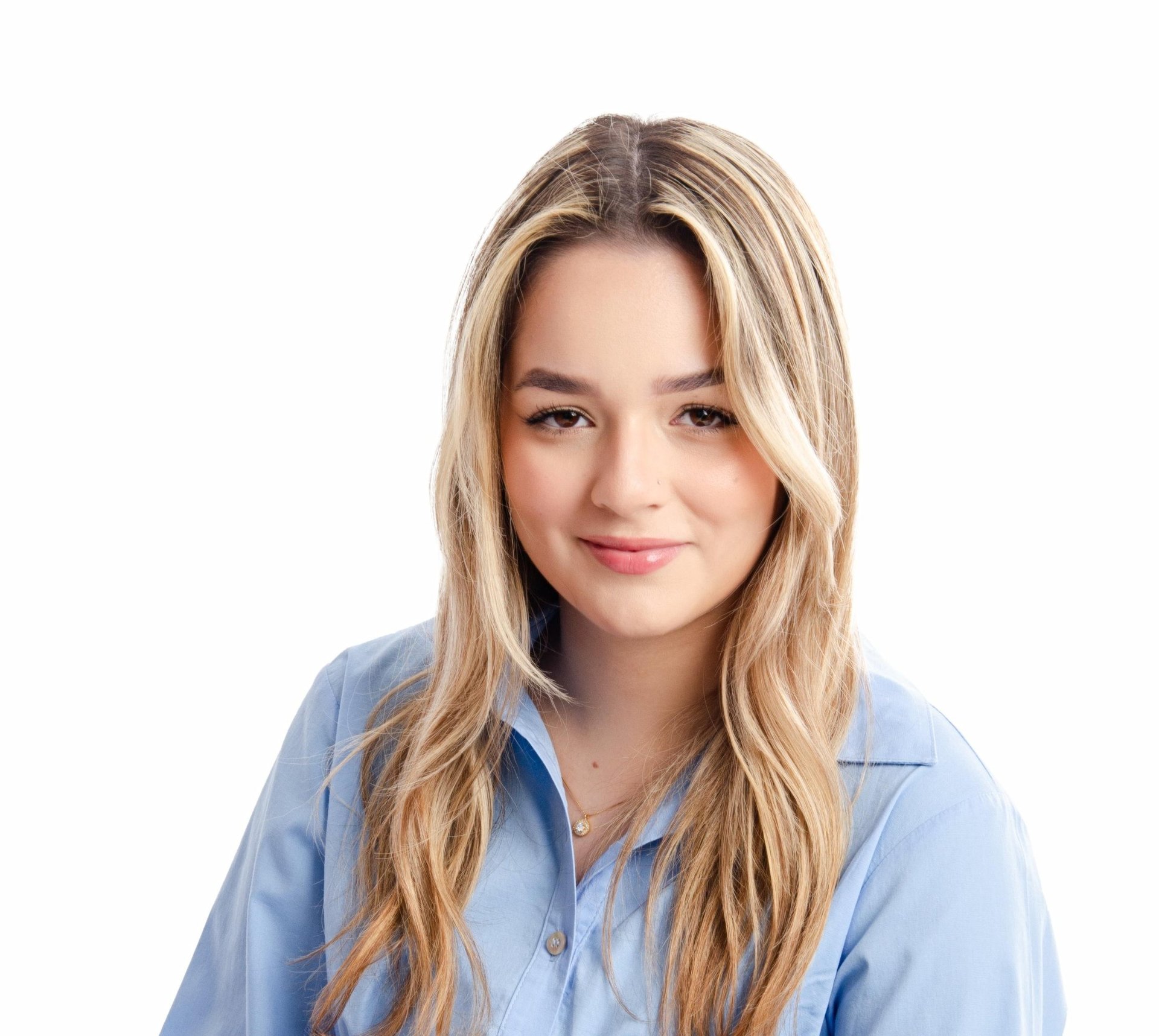 an abstract photo of a curved building with a blue sky in the background