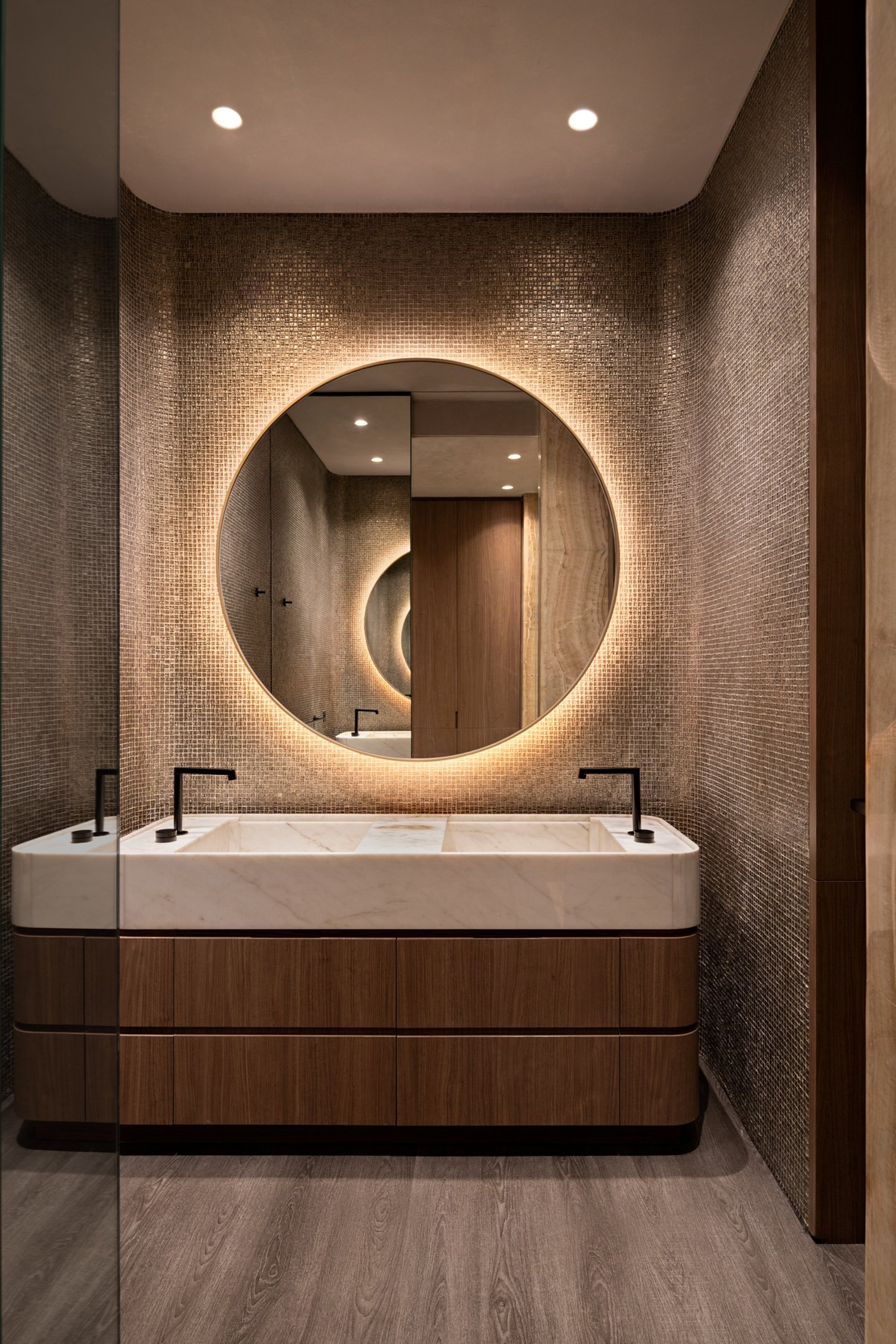 an abstract photo of a curved building with a blue sky in the background