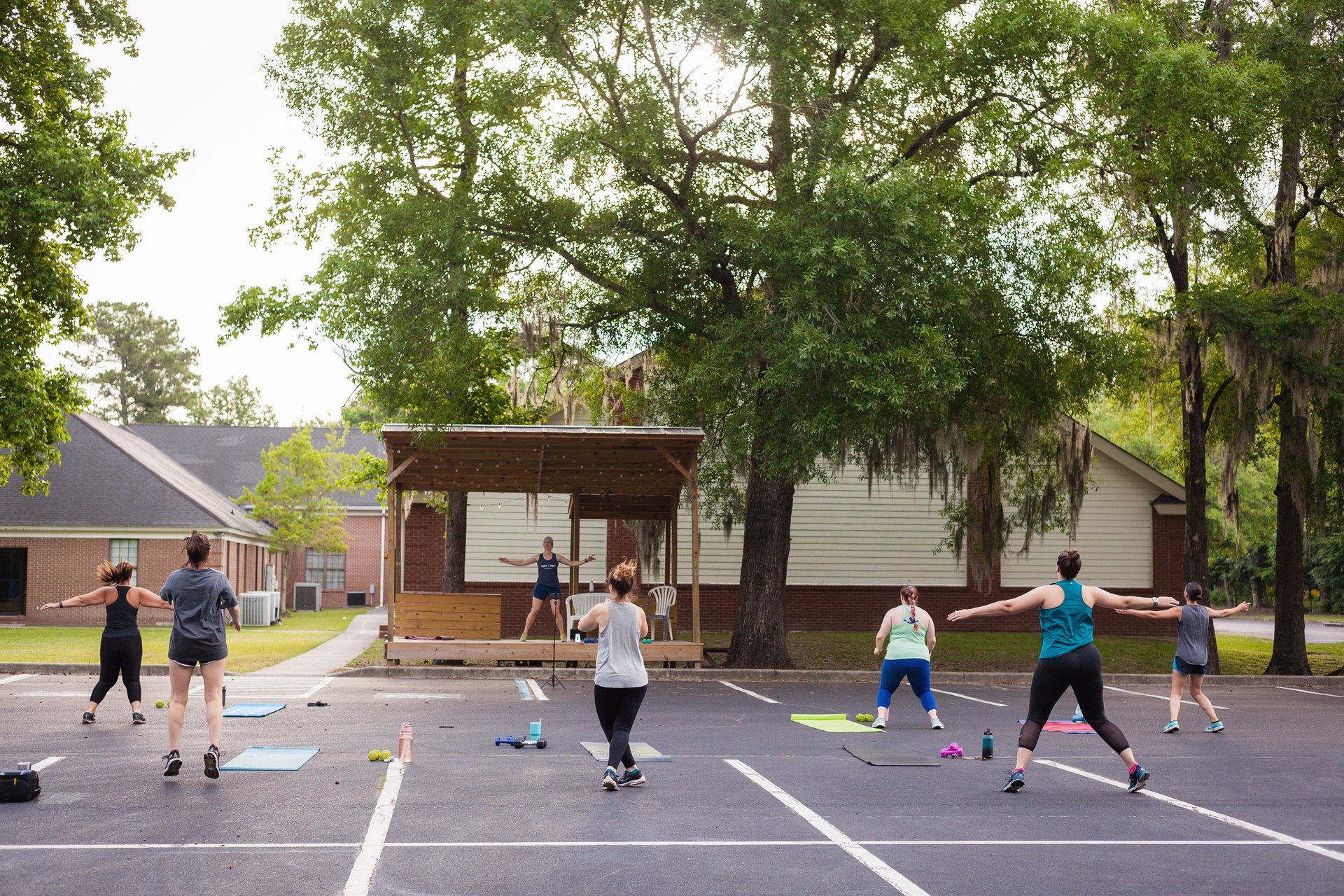 woman wearing yellow long-sleeved dress under white clouds and blue sky during daytime
