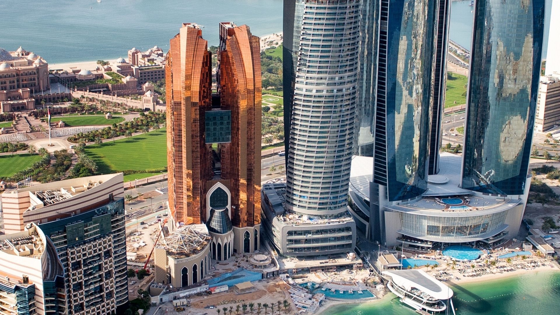 "Abu Dhabi skyscrapers and modern towers with luxury waterfront development UAE"