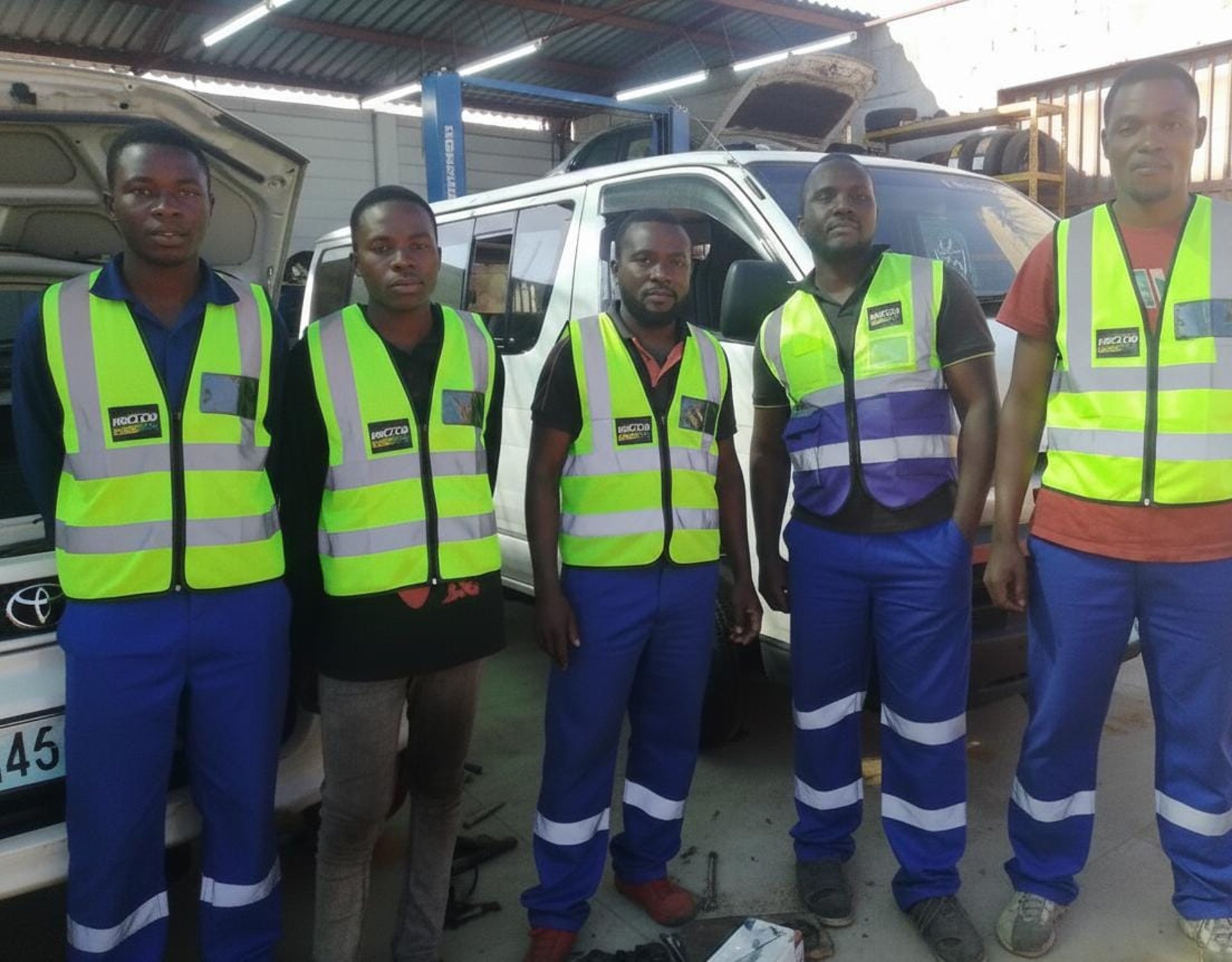 black and brown leather padded tub sofa