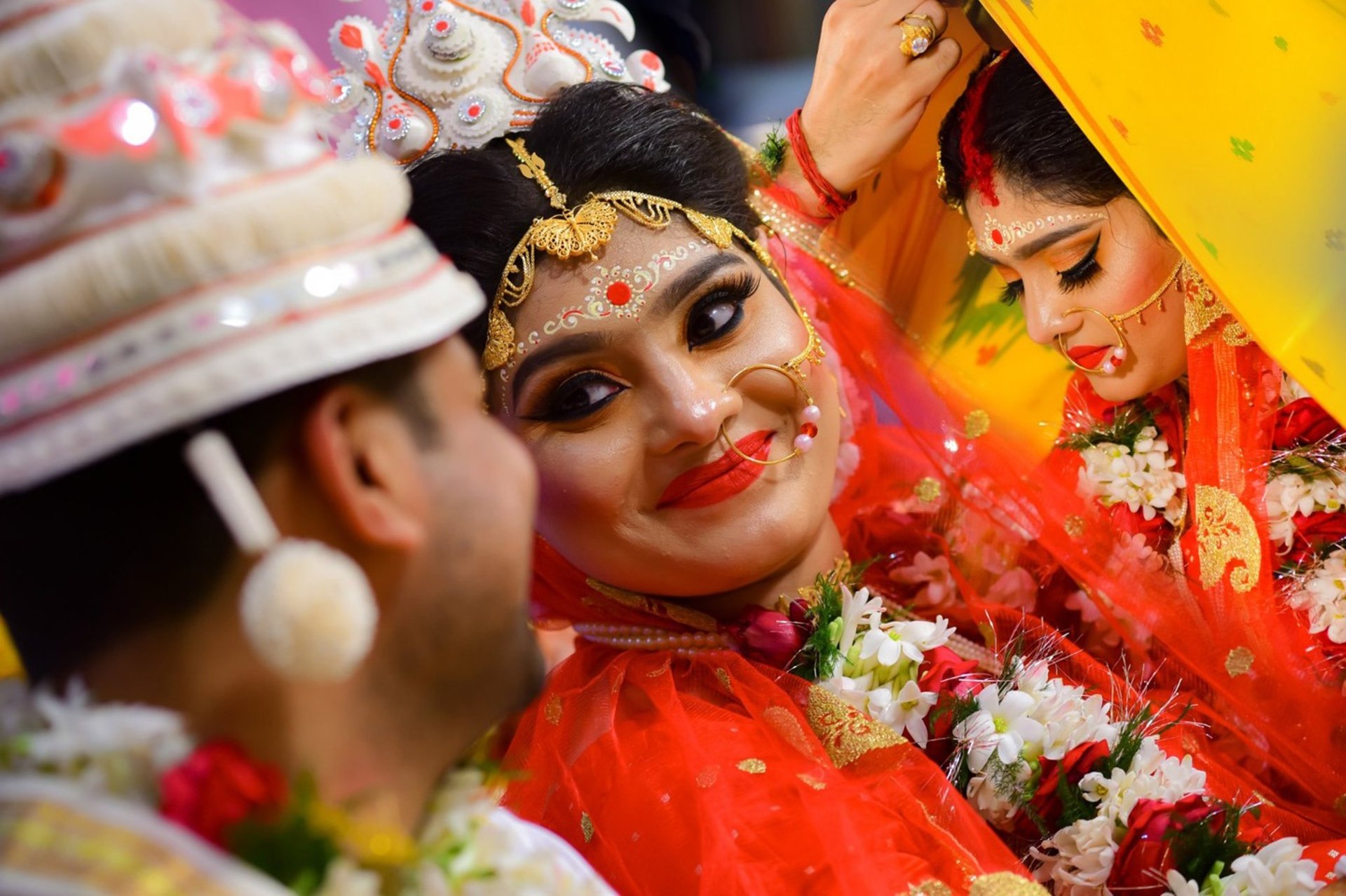 woman wearing yellow long-sleeved dress under white clouds and blue sky during daytime
