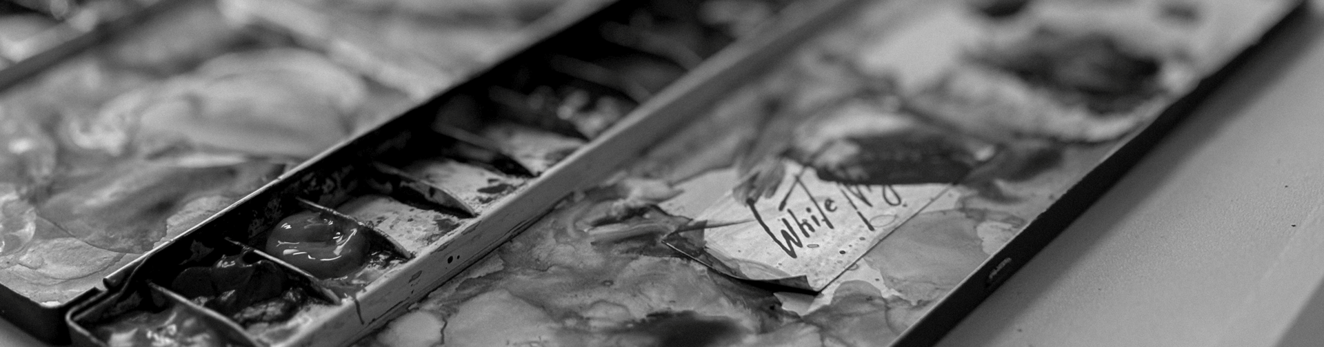 an abstract photo of a curved building with a blue sky in the background