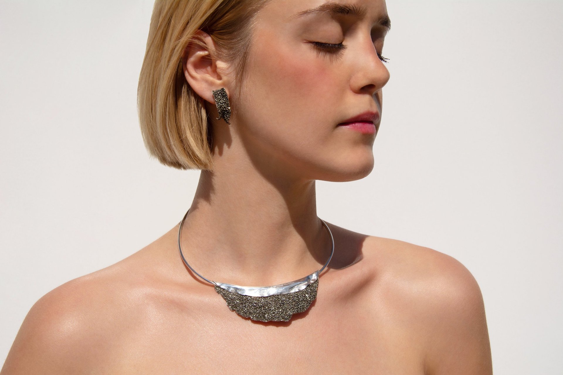 a painting of two women in bed looking out a window