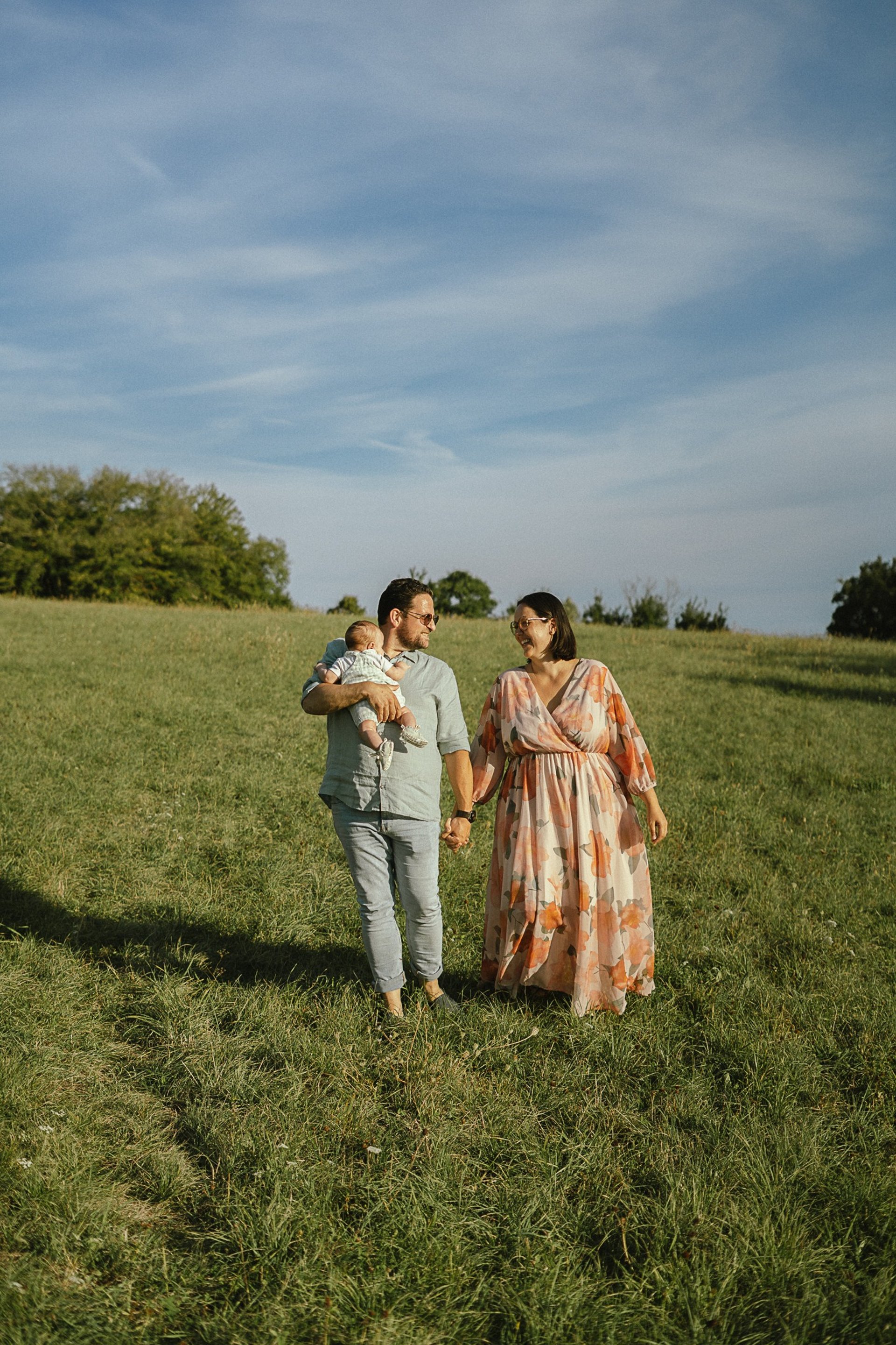 woman wearing yellow long-sleeved dress under white clouds and blue sky during daytime