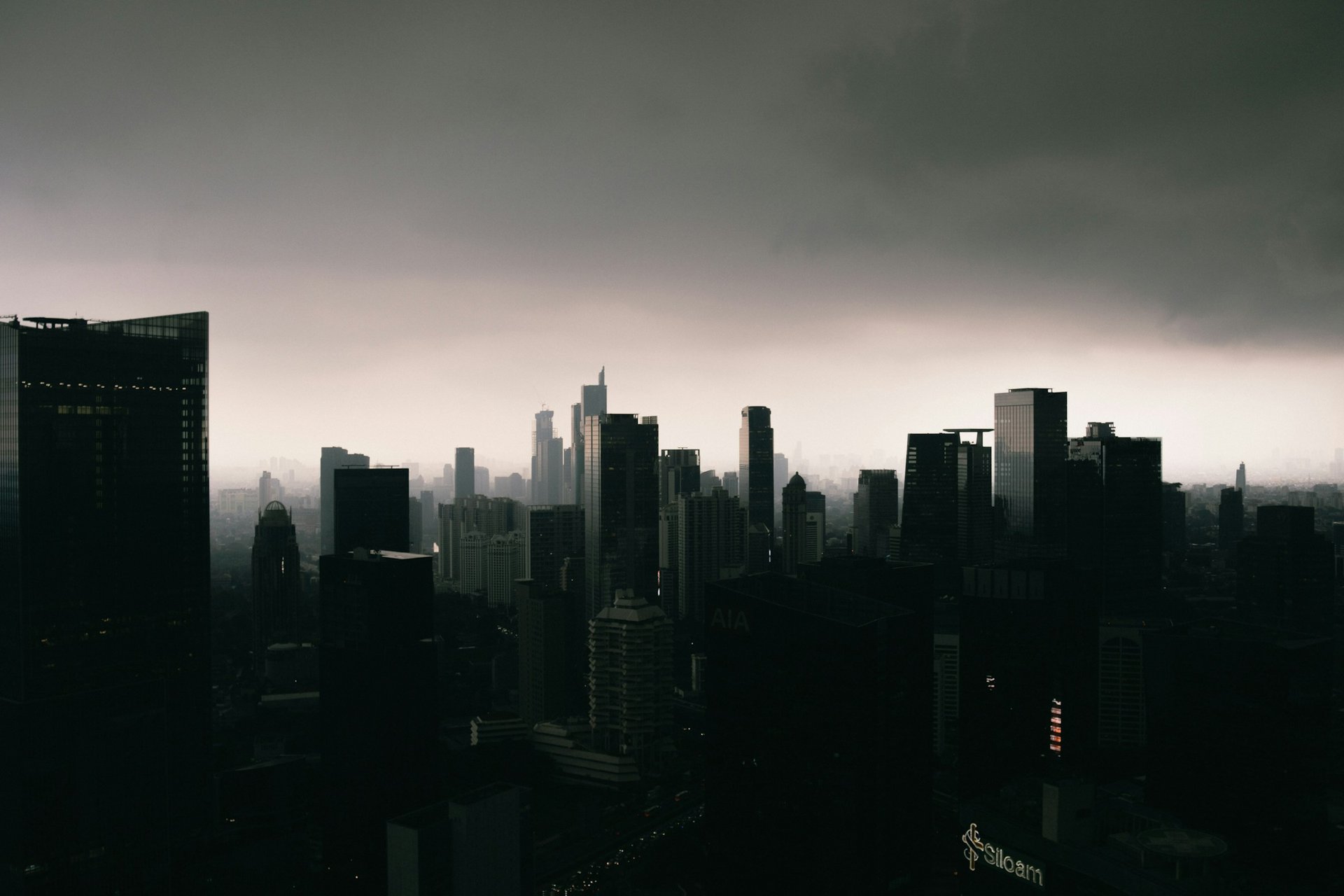 silhouette photography of high-rise buildings
