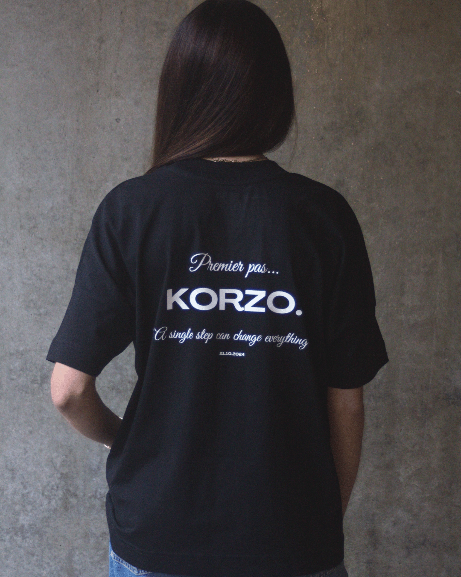 an abstract photo of a curved building with a blue sky in the background