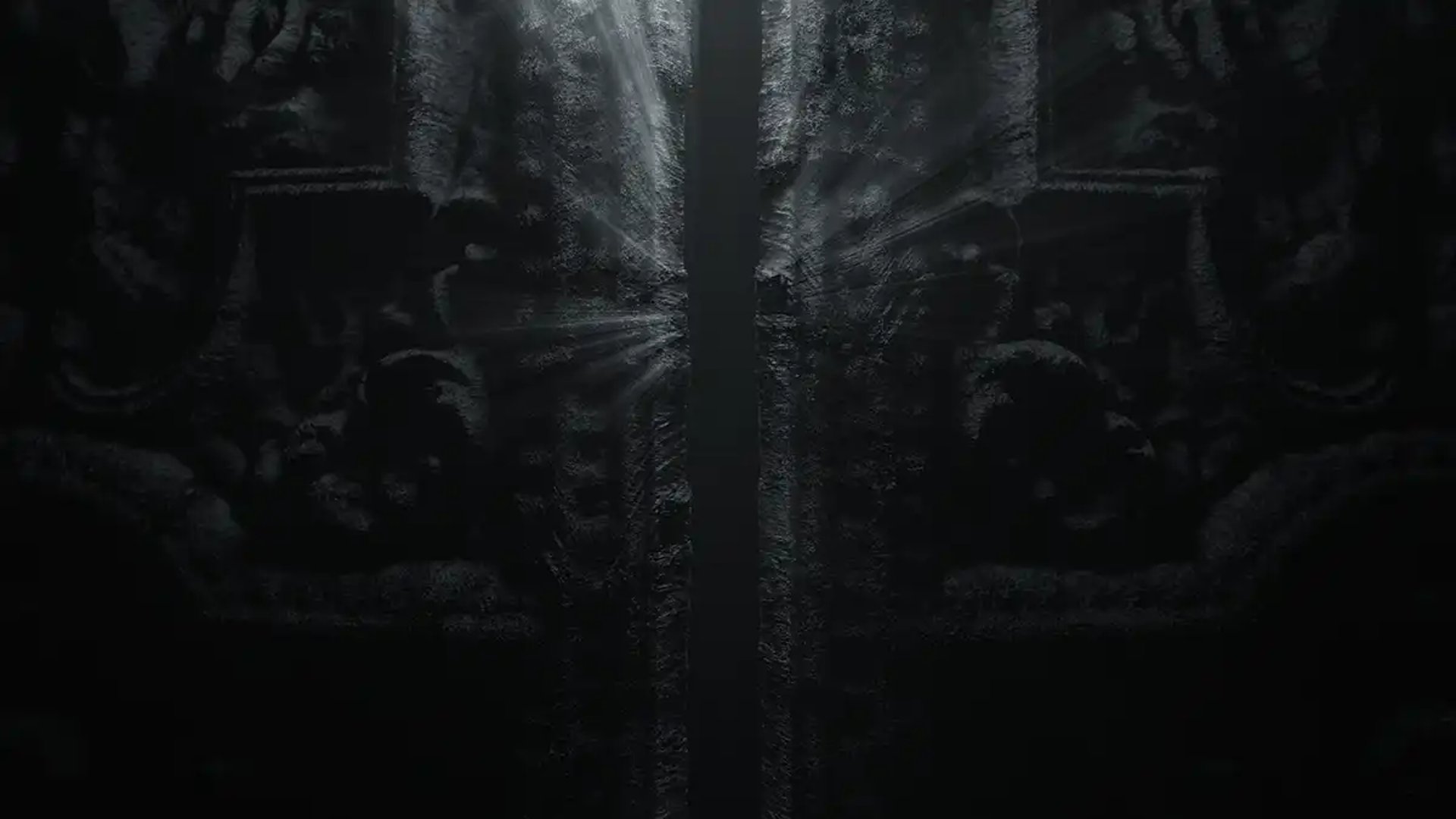 an abstract photo of a curved building with a blue sky in the background