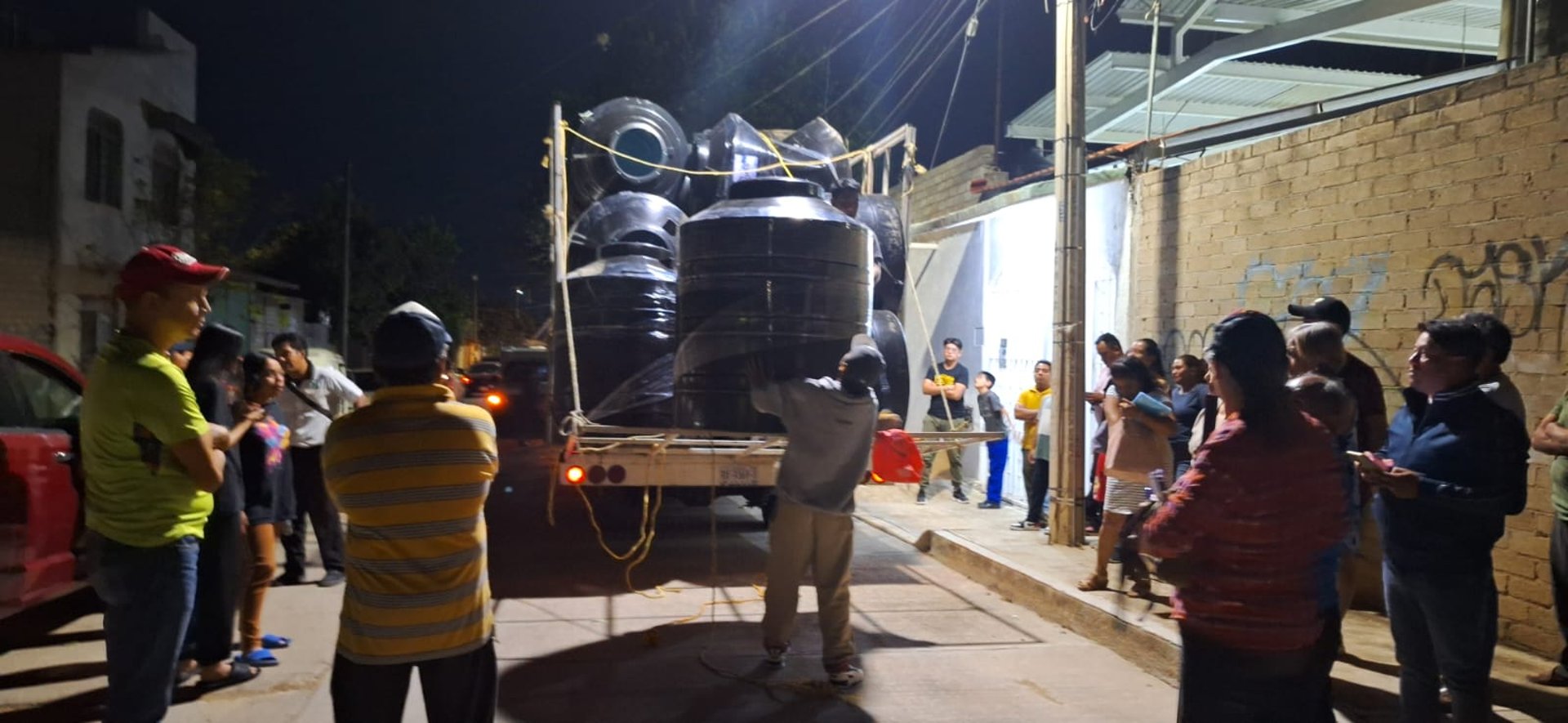 woman wearing yellow long-sleeved dress under white clouds and blue sky during daytime