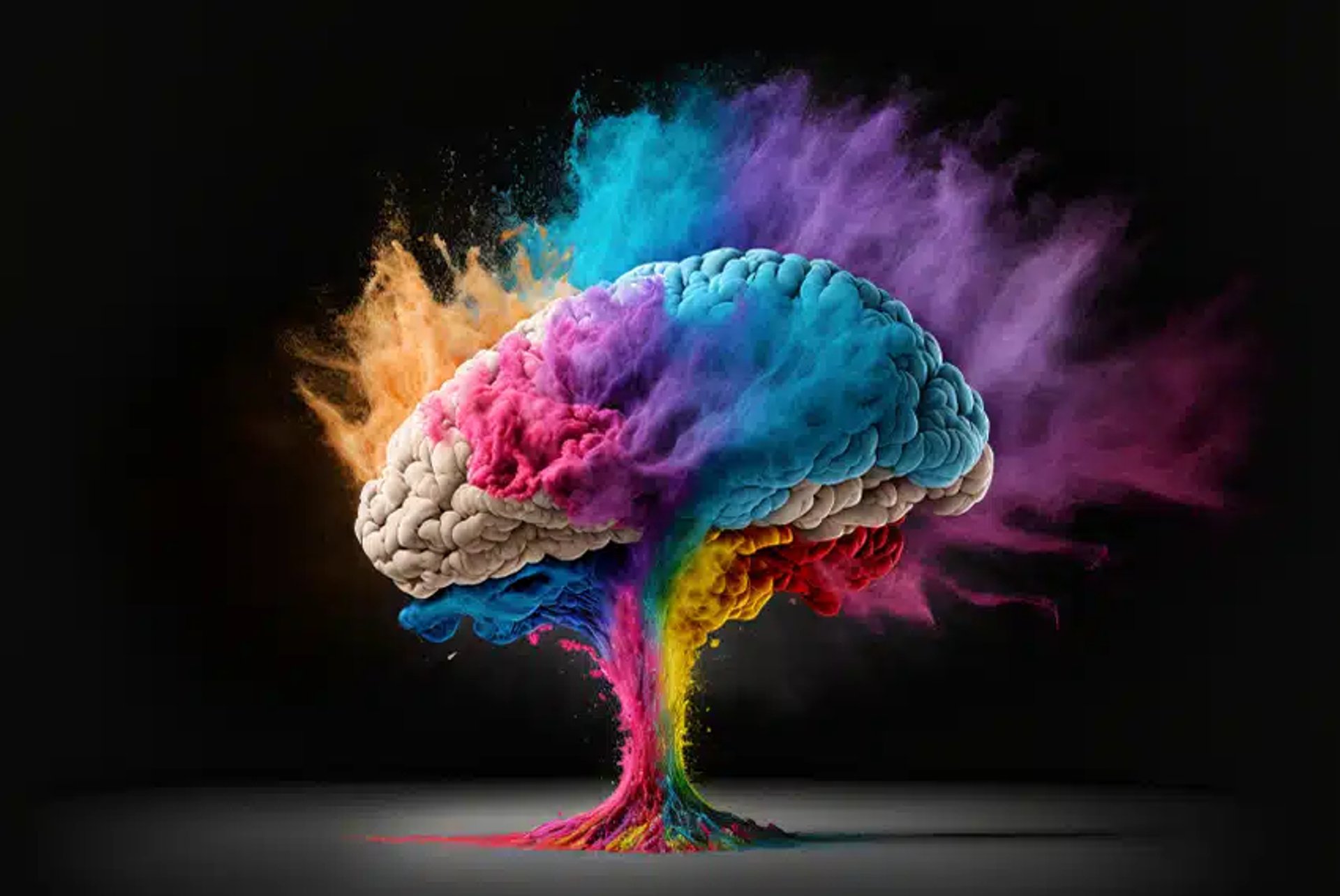 Colorful artistic brain with splashes of blue, purple, and orange, representing creative AI and graphic design.
