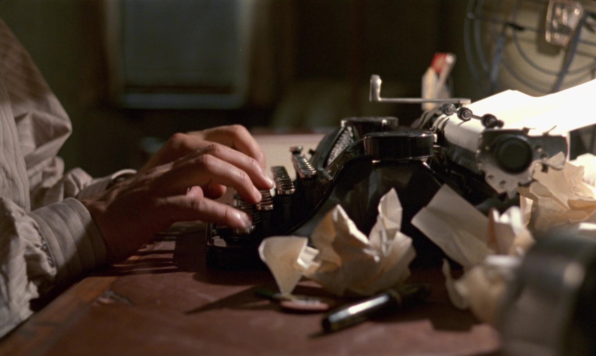 an abstract photo of a curved building with a blue sky in the background