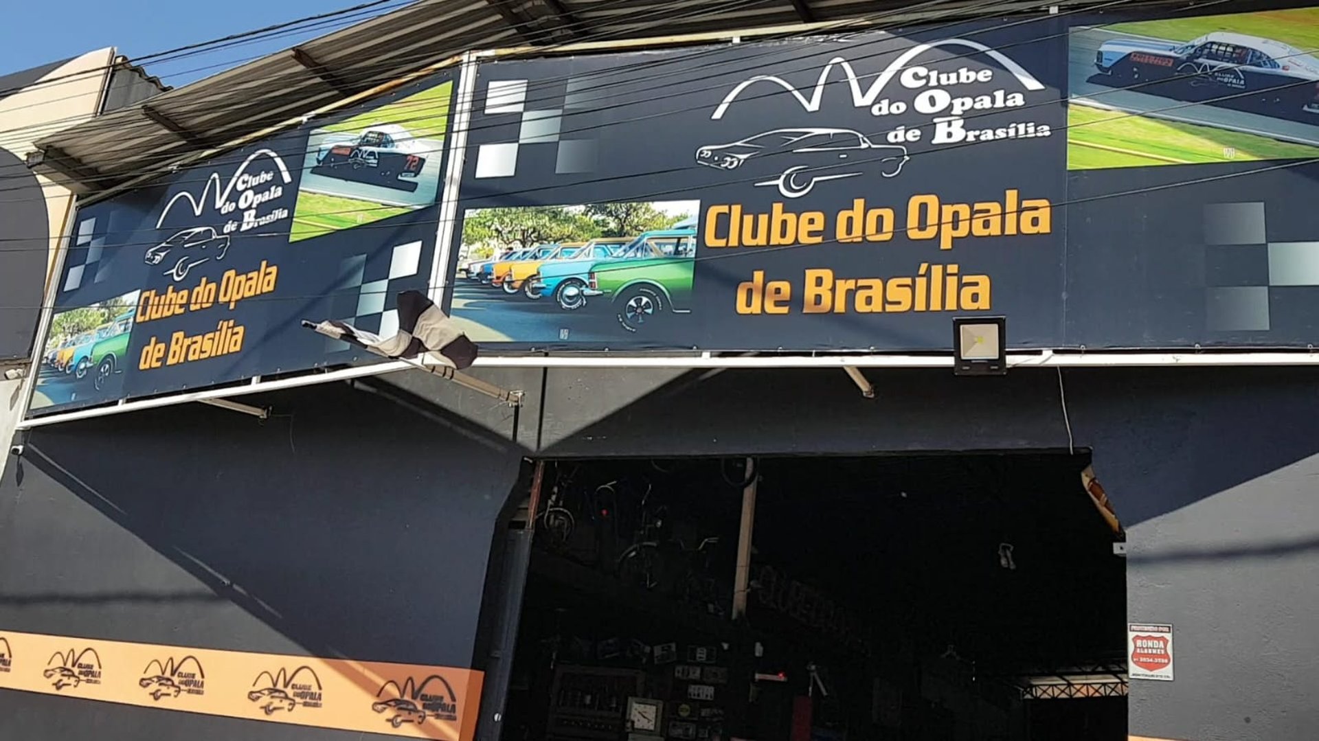 black and brown leather padded tub sofa