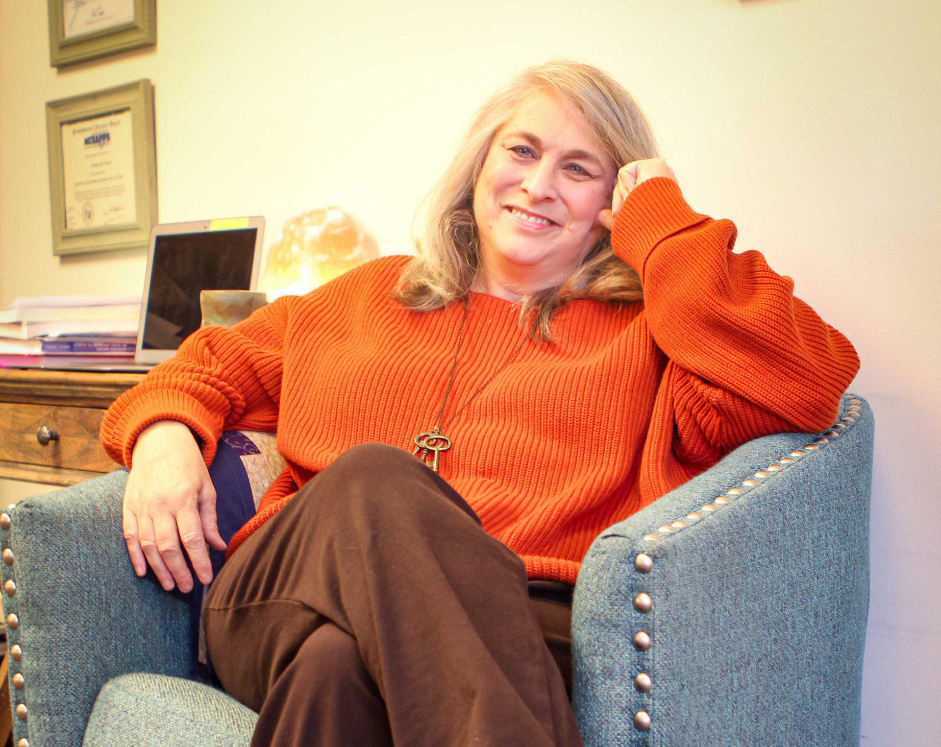 an abstract photo of a curved building with a blue sky in the background