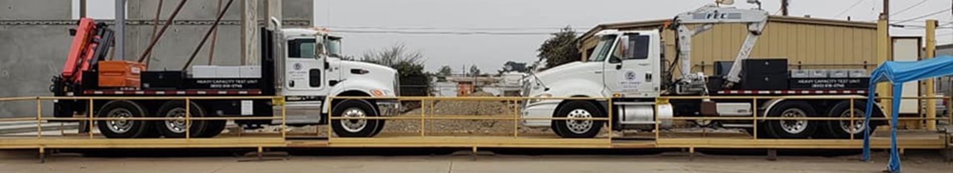 an abstract photo of a curved building with a blue sky in the background