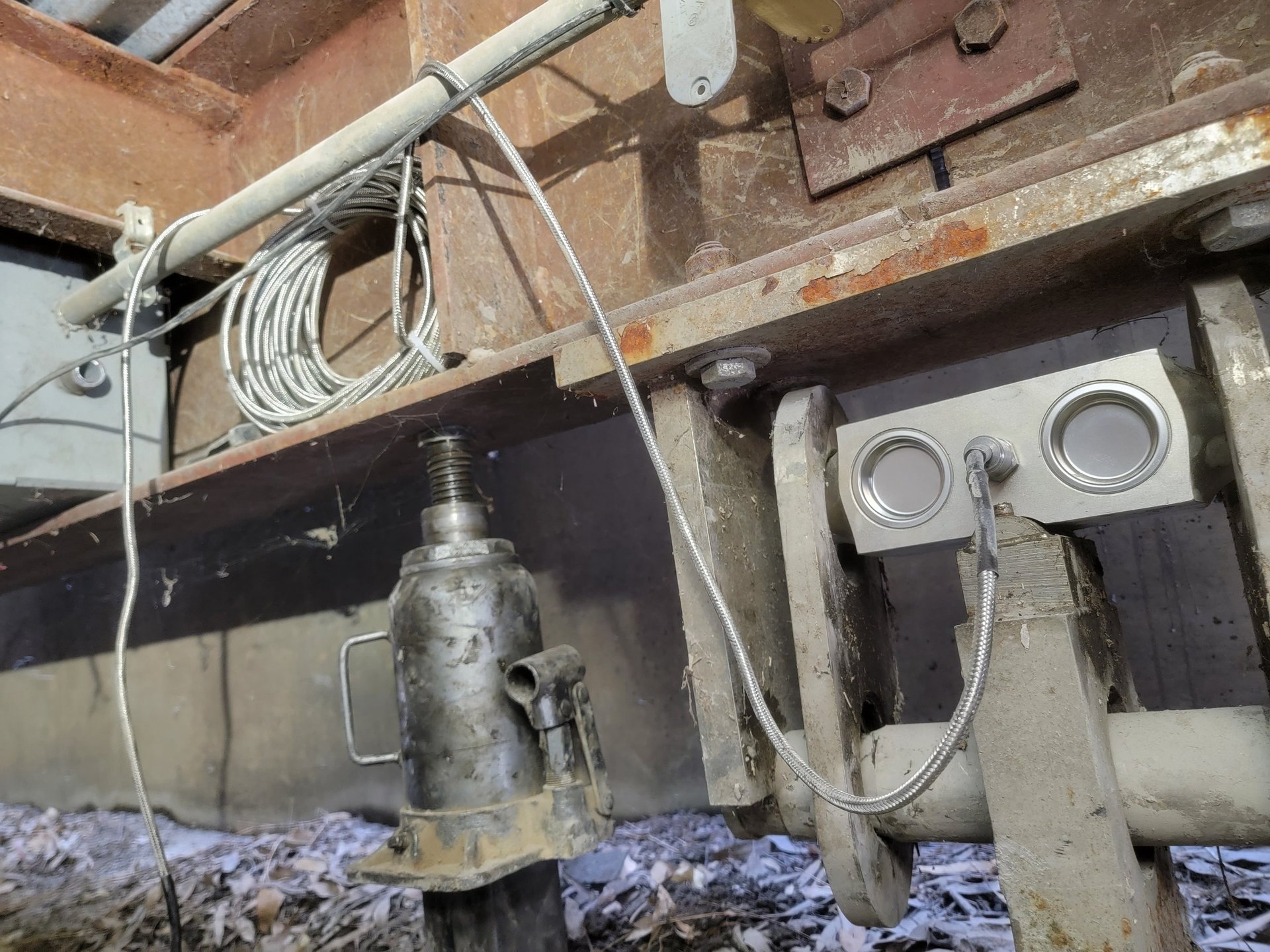 an abstract photo of a curved building with a blue sky in the background