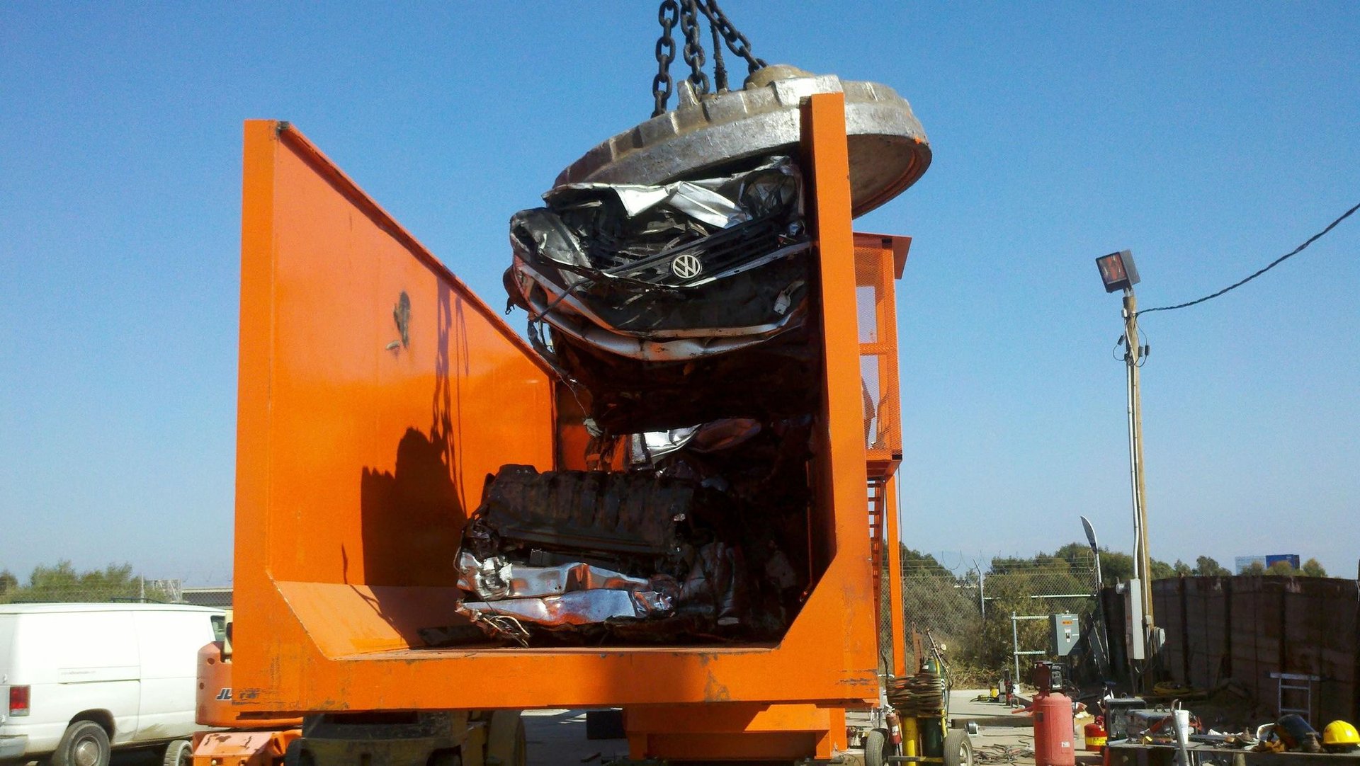 an abstract photo of a curved building with a blue sky in the background