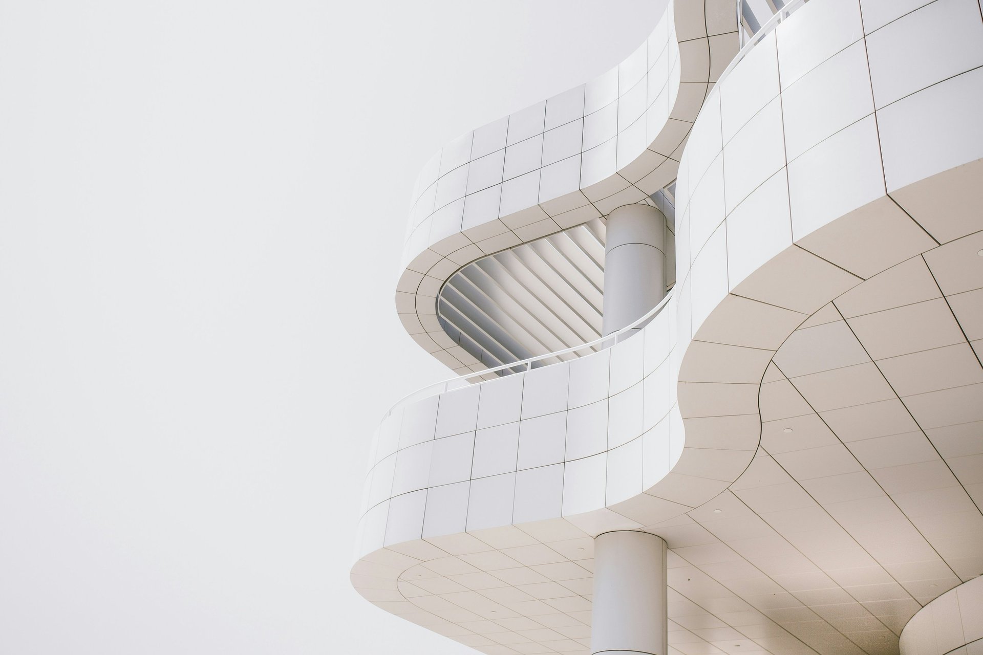 low angle view photography of a gray building