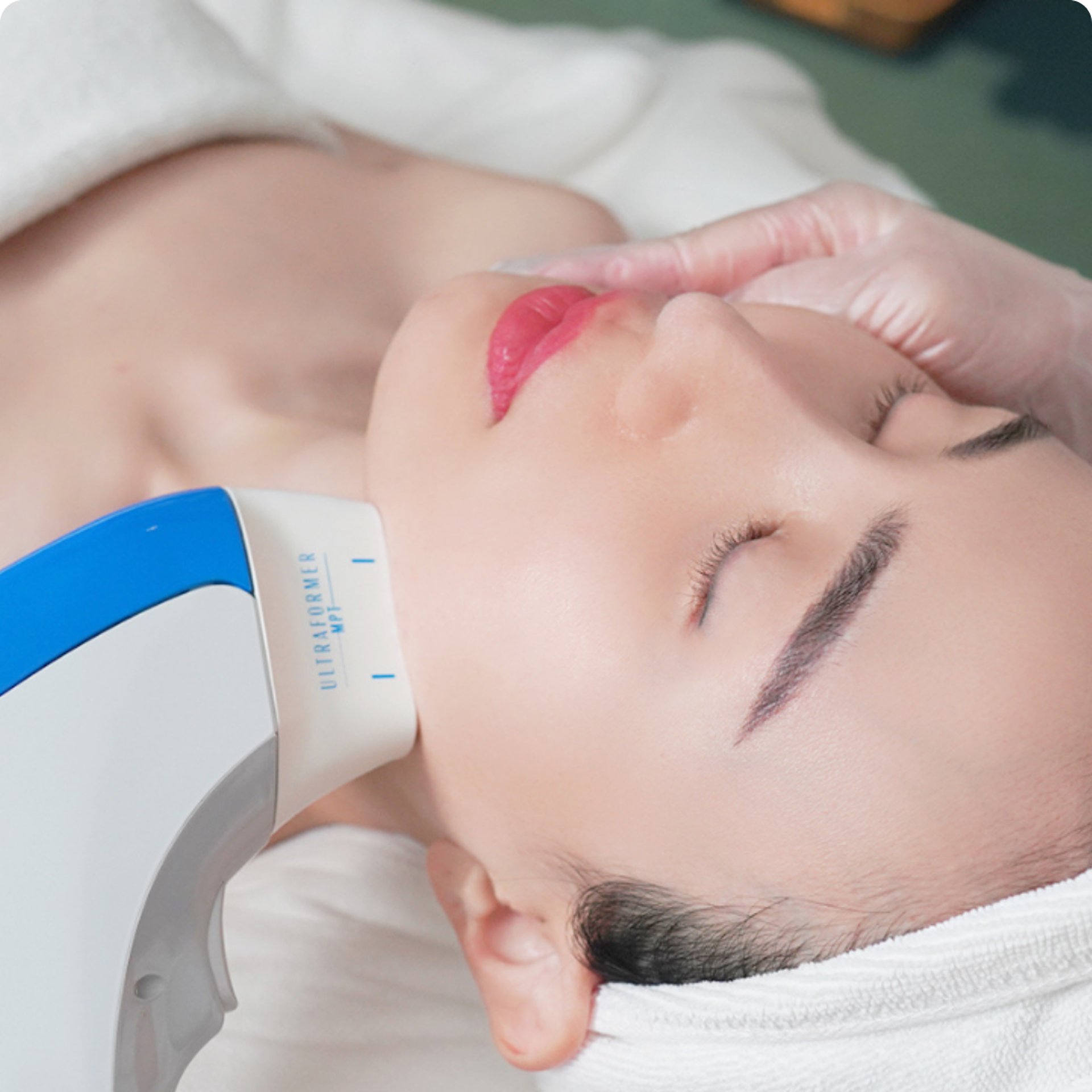 an abstract photo of a curved building with a blue sky in the background