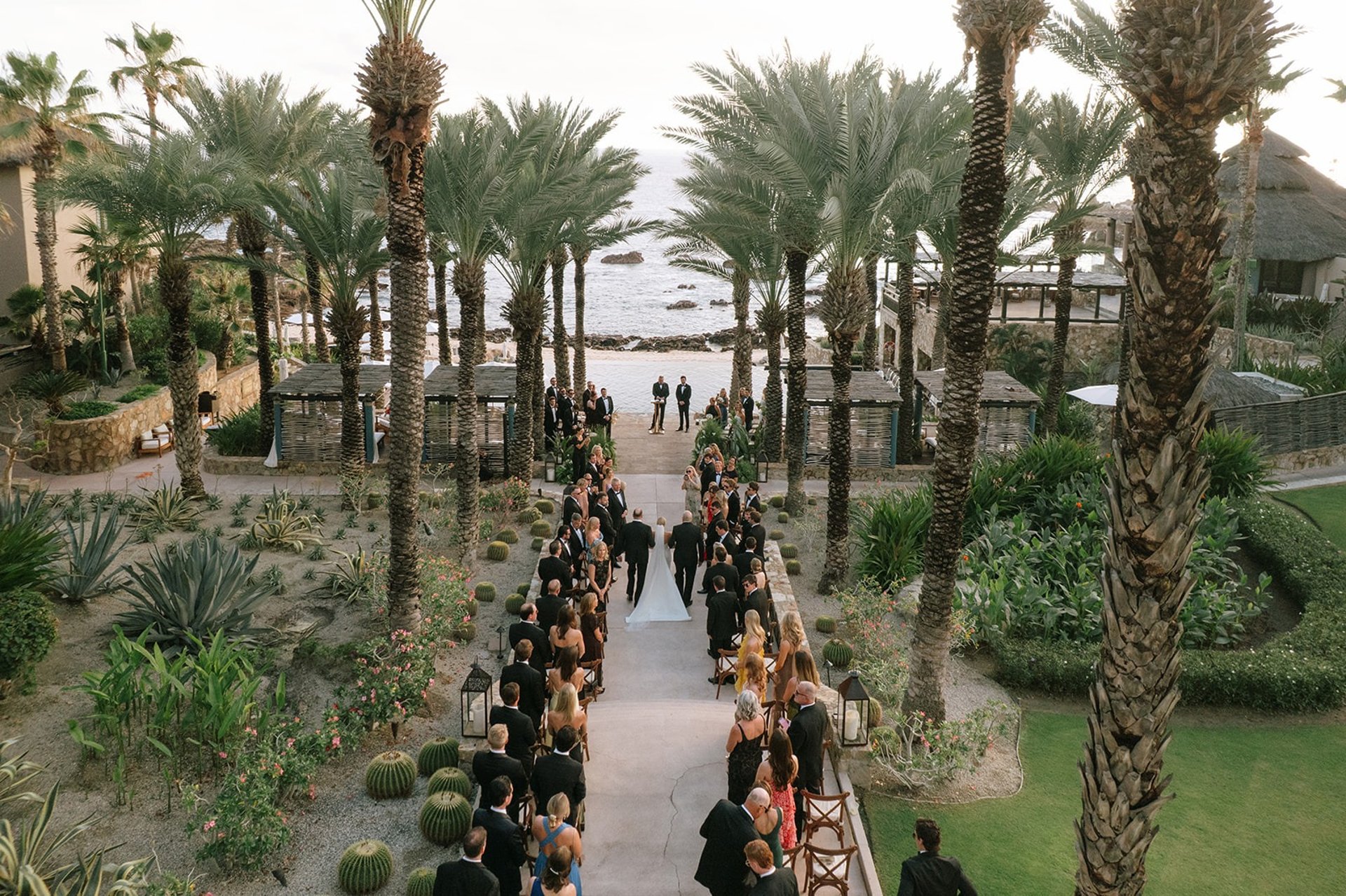 an abstract photo of a curved building with a blue sky in the background
