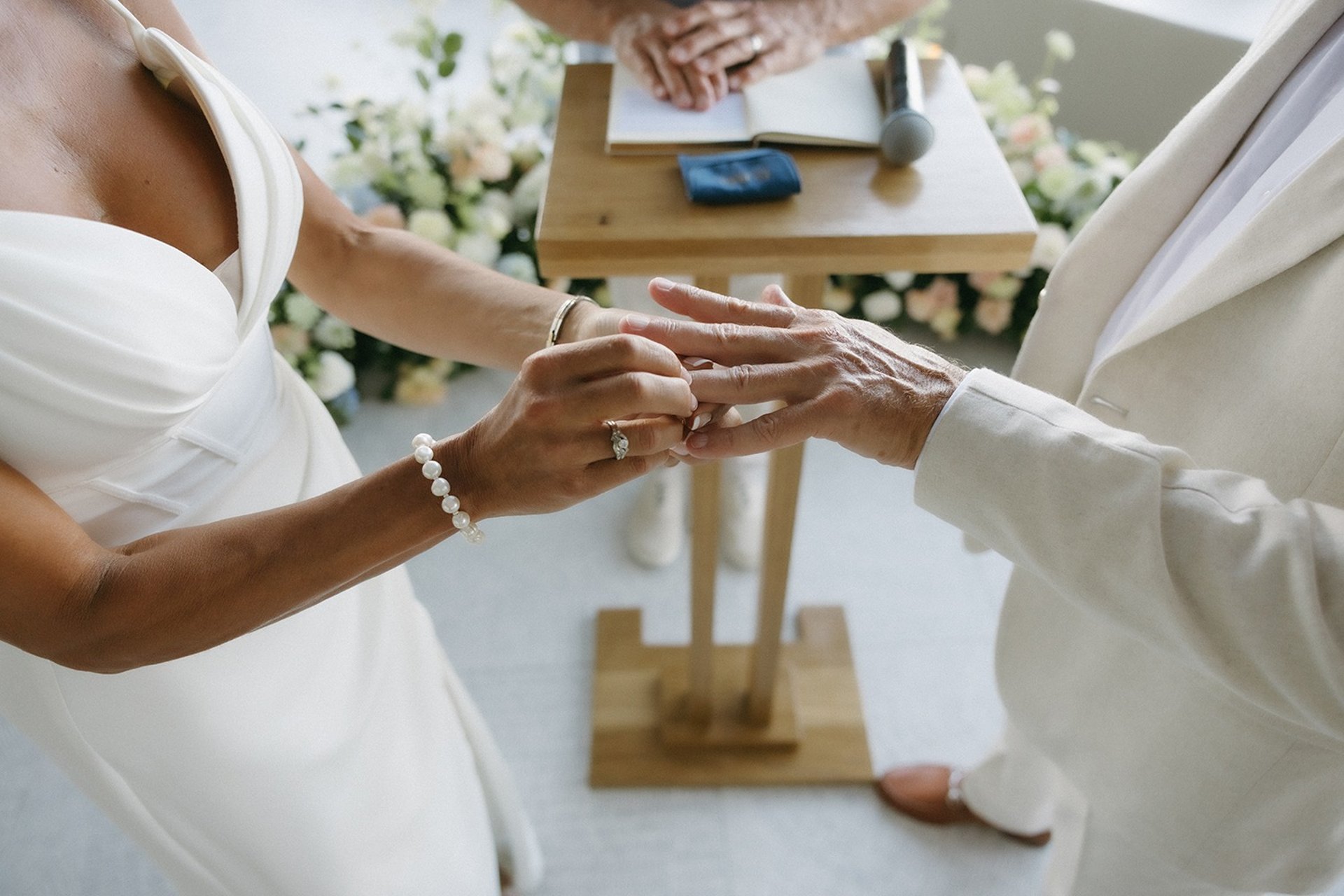 an abstract photo of a curved building with a blue sky in the background