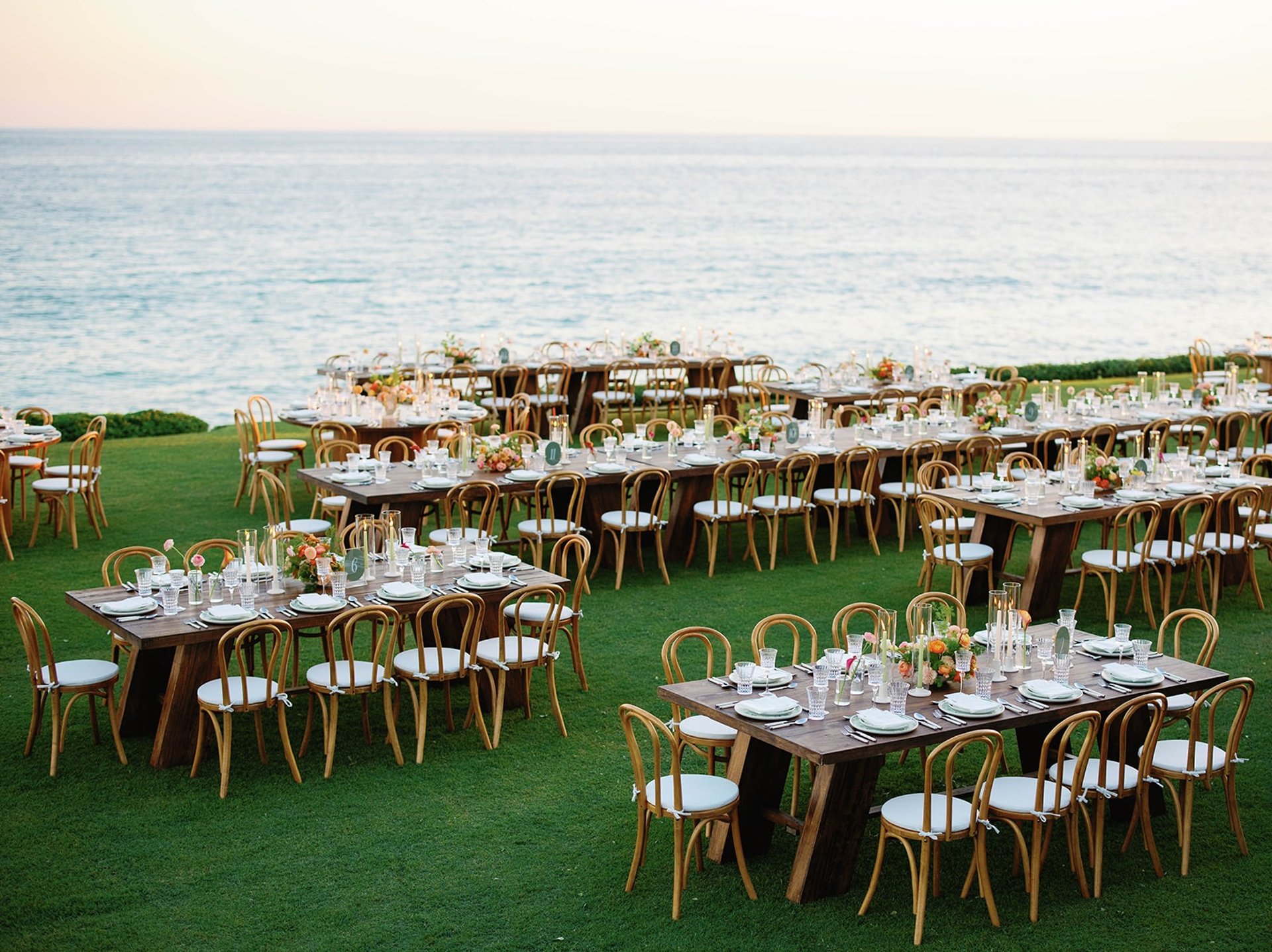 an abstract photo of a curved building with a blue sky in the background