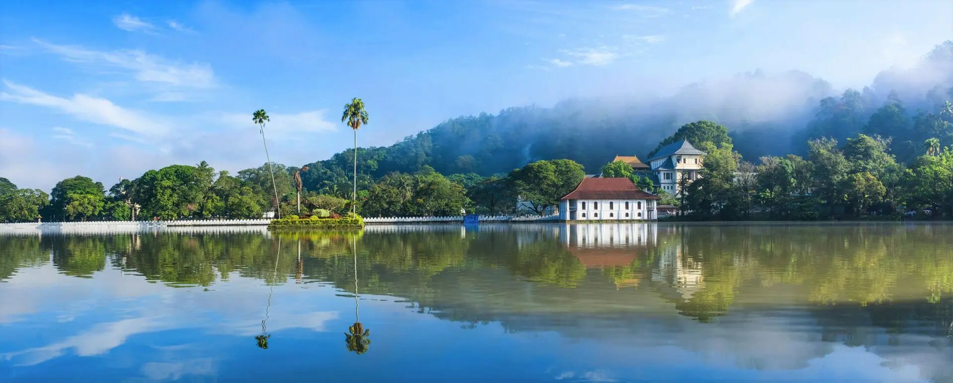black and brown leather padded tub sofa