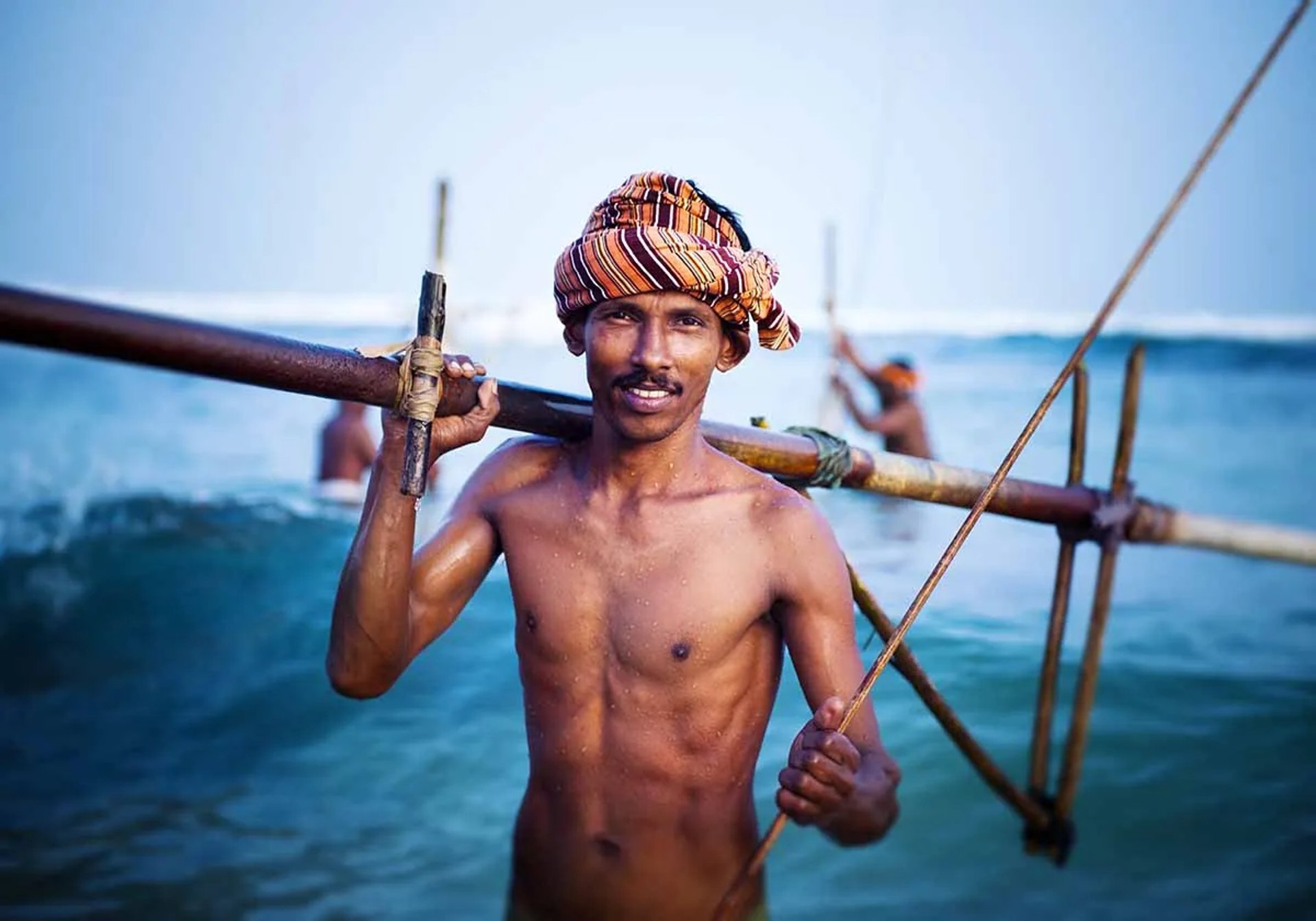 black and brown leather padded tub sofa