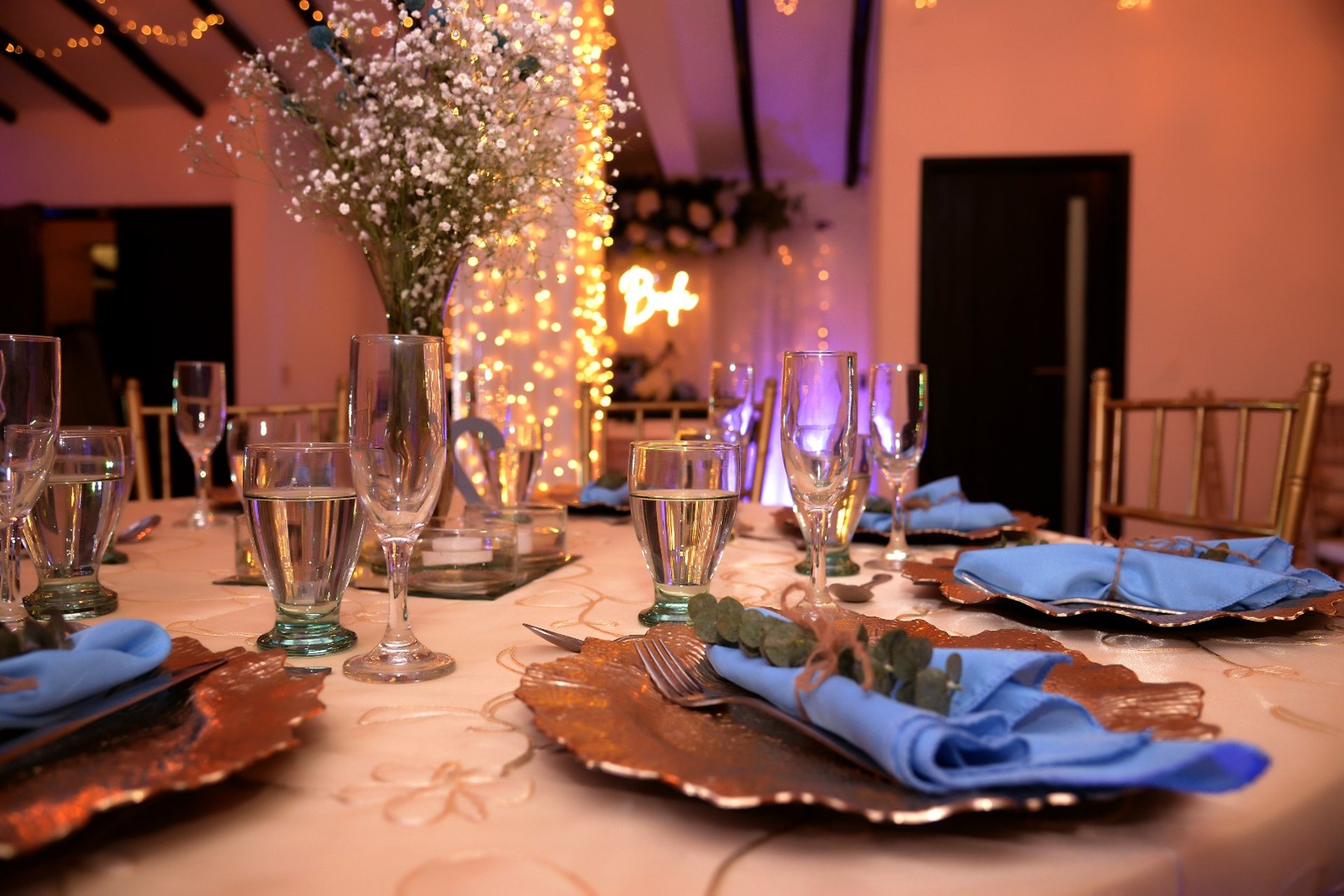 woman wearing yellow long-sleeved dress under white clouds and blue sky during daytime