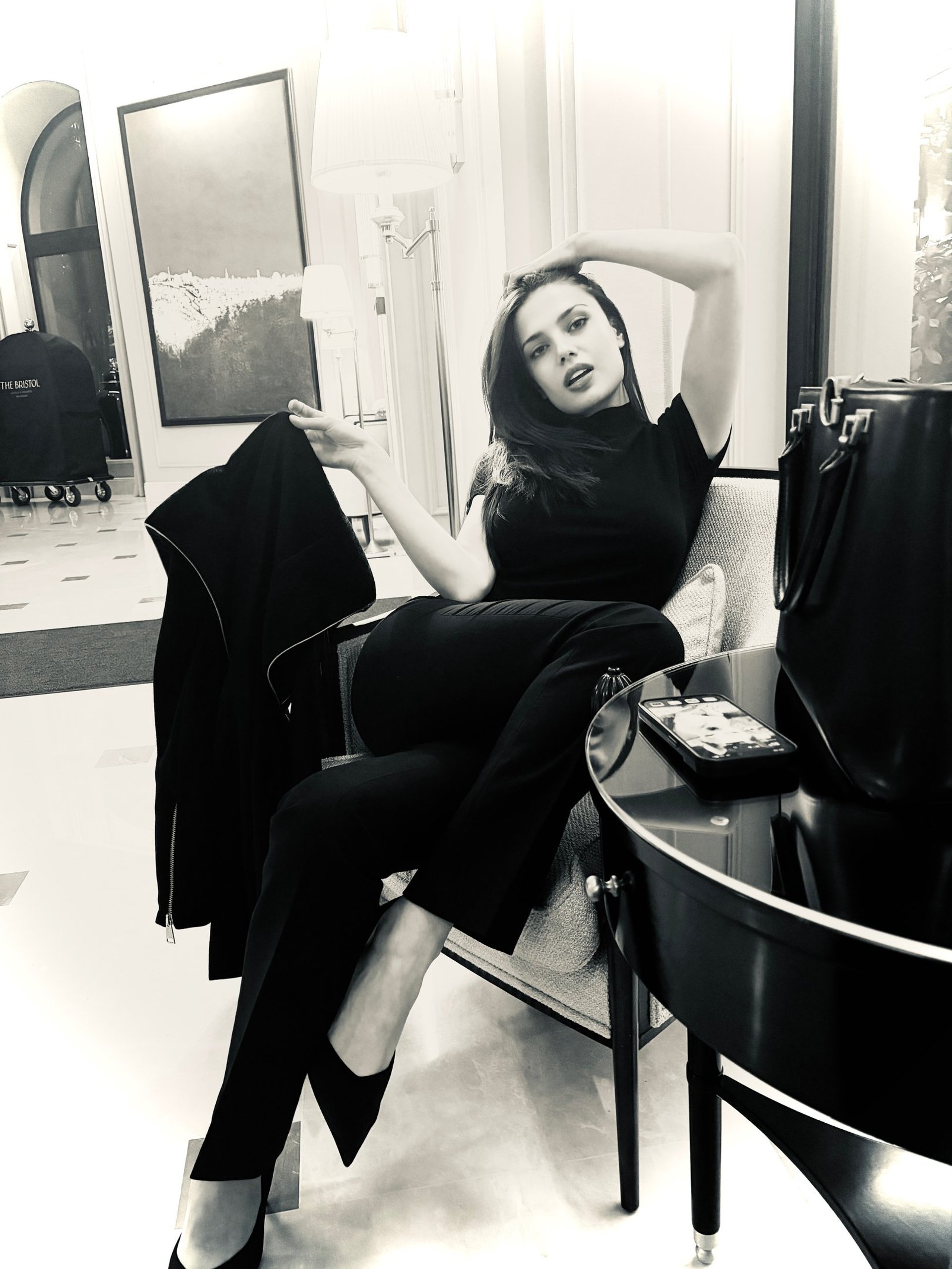 an abstract photo of a curved building with a blue sky in the background