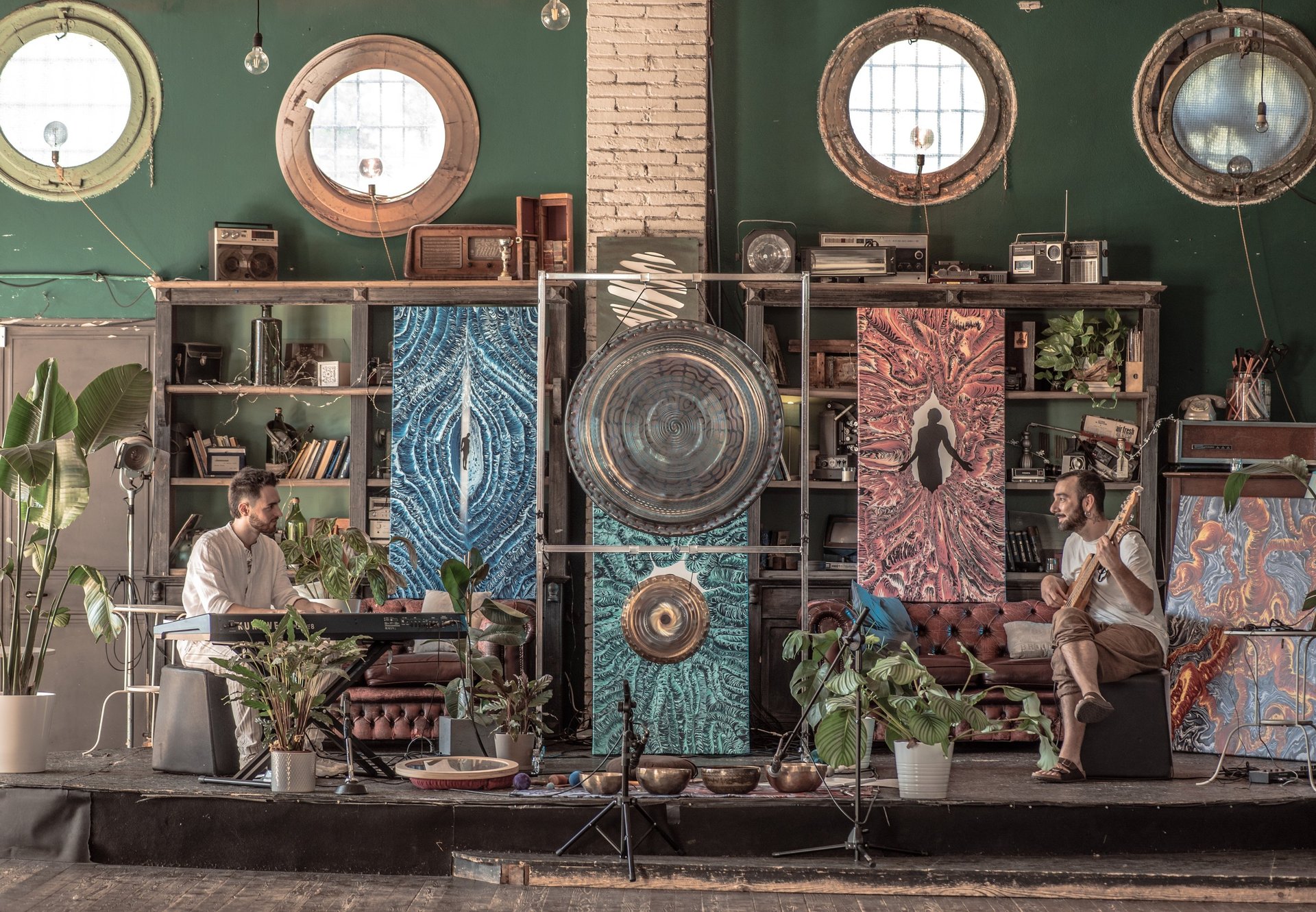 black and brown leather padded tub sofa