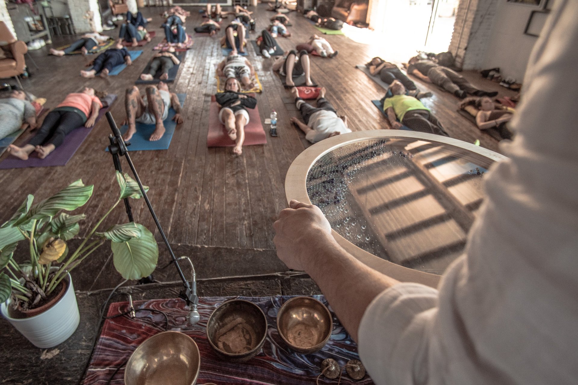 an abstract photo of a curved building with a blue sky in the background