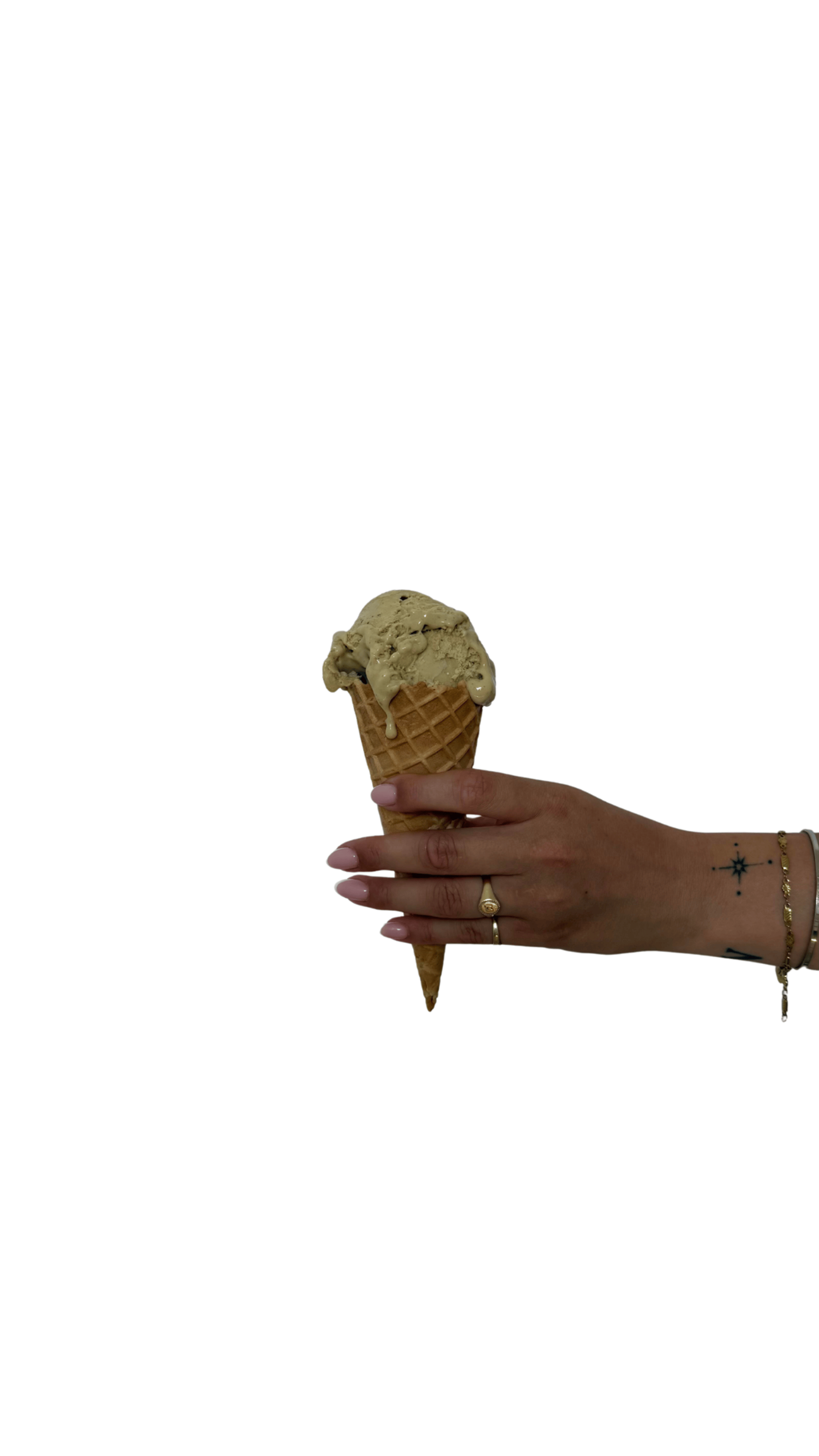 an ice cream cone is casting a shadow on the ground