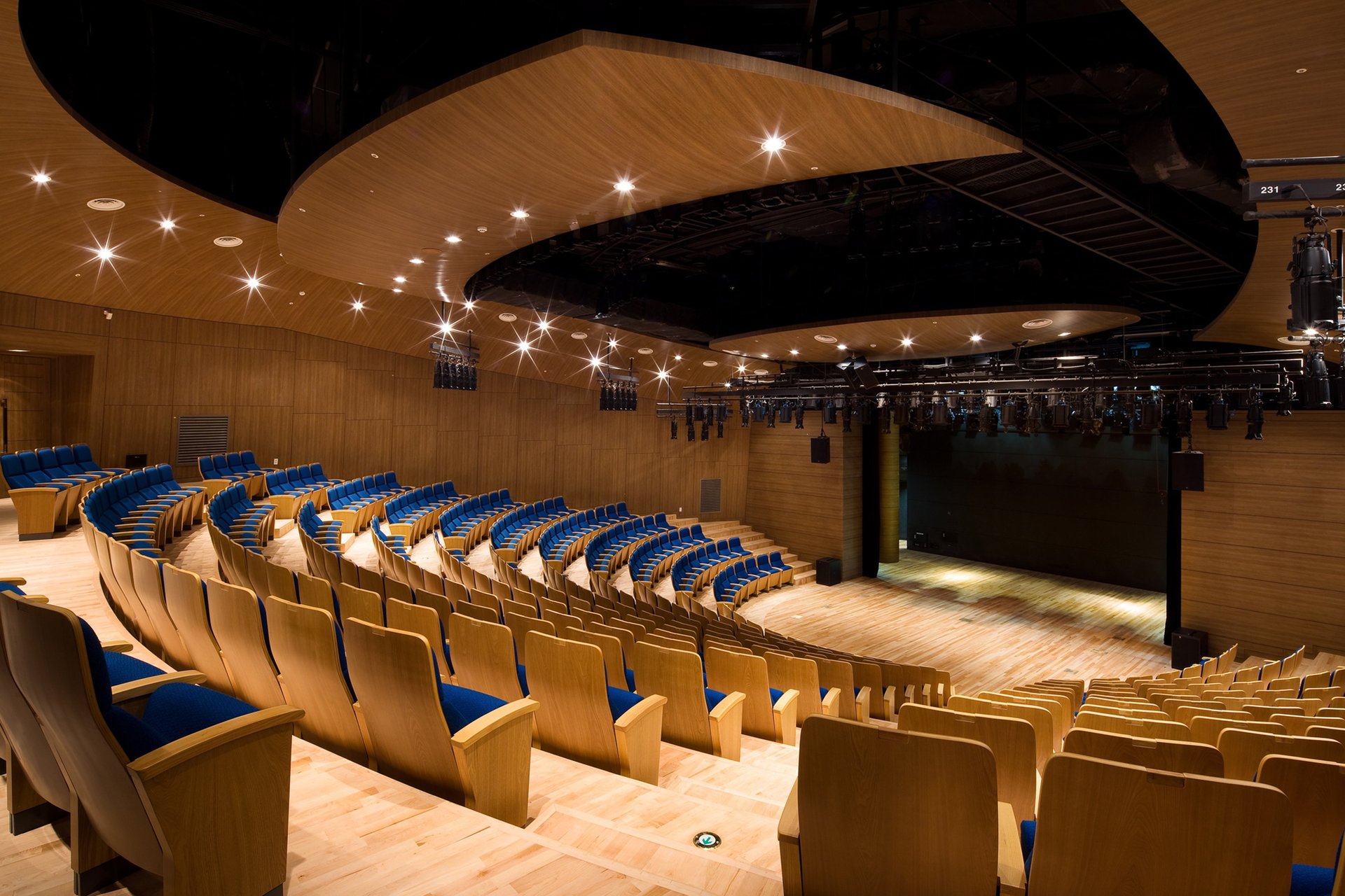 a room filled with lots of tables and chairs