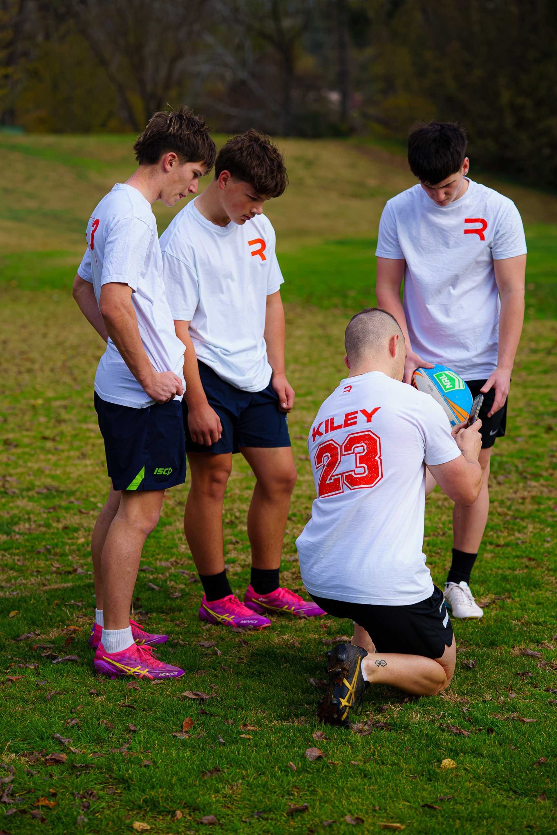 a view of a baseball field through a fence