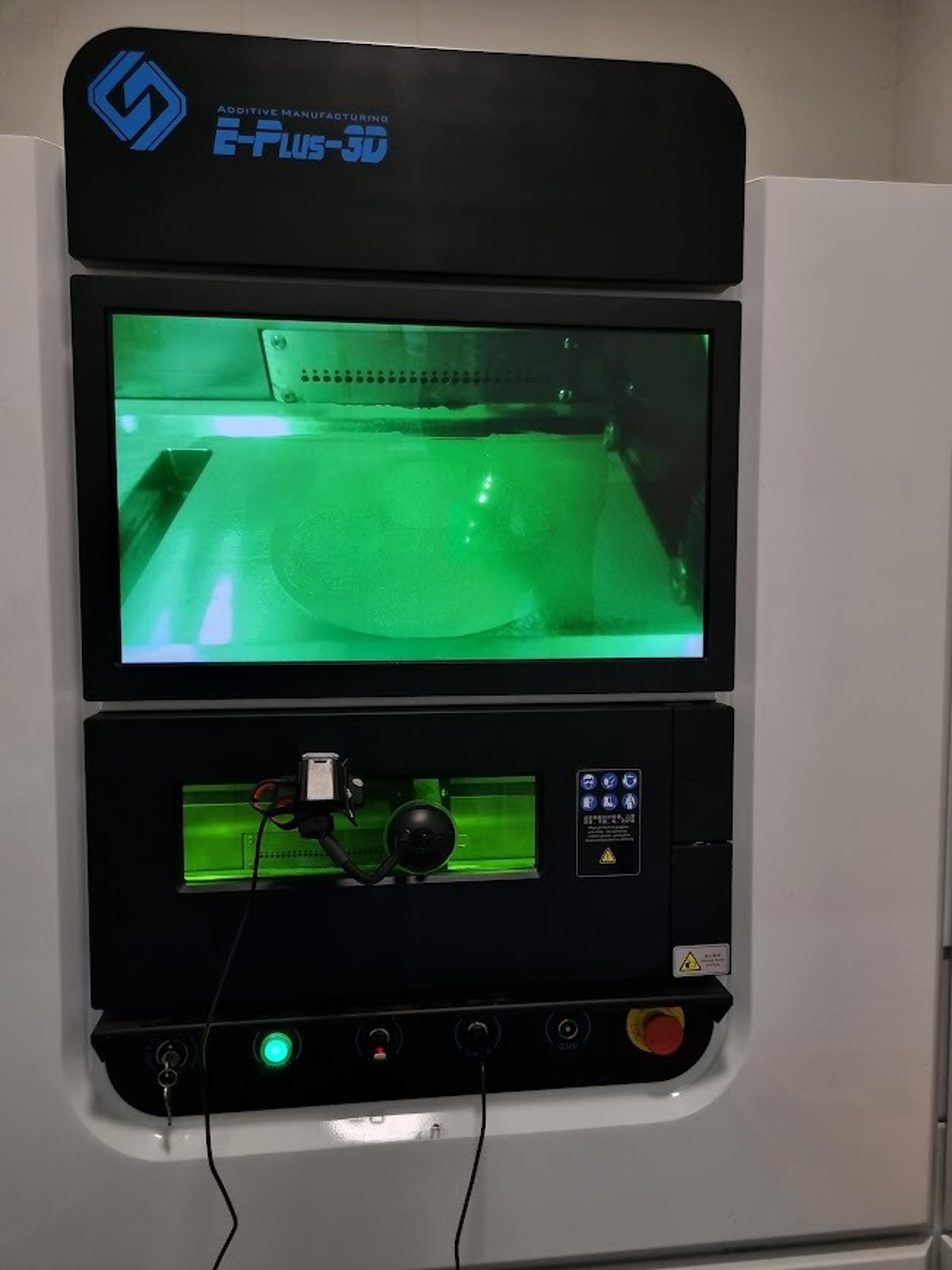 an abstract photo of a curved building with a blue sky in the background