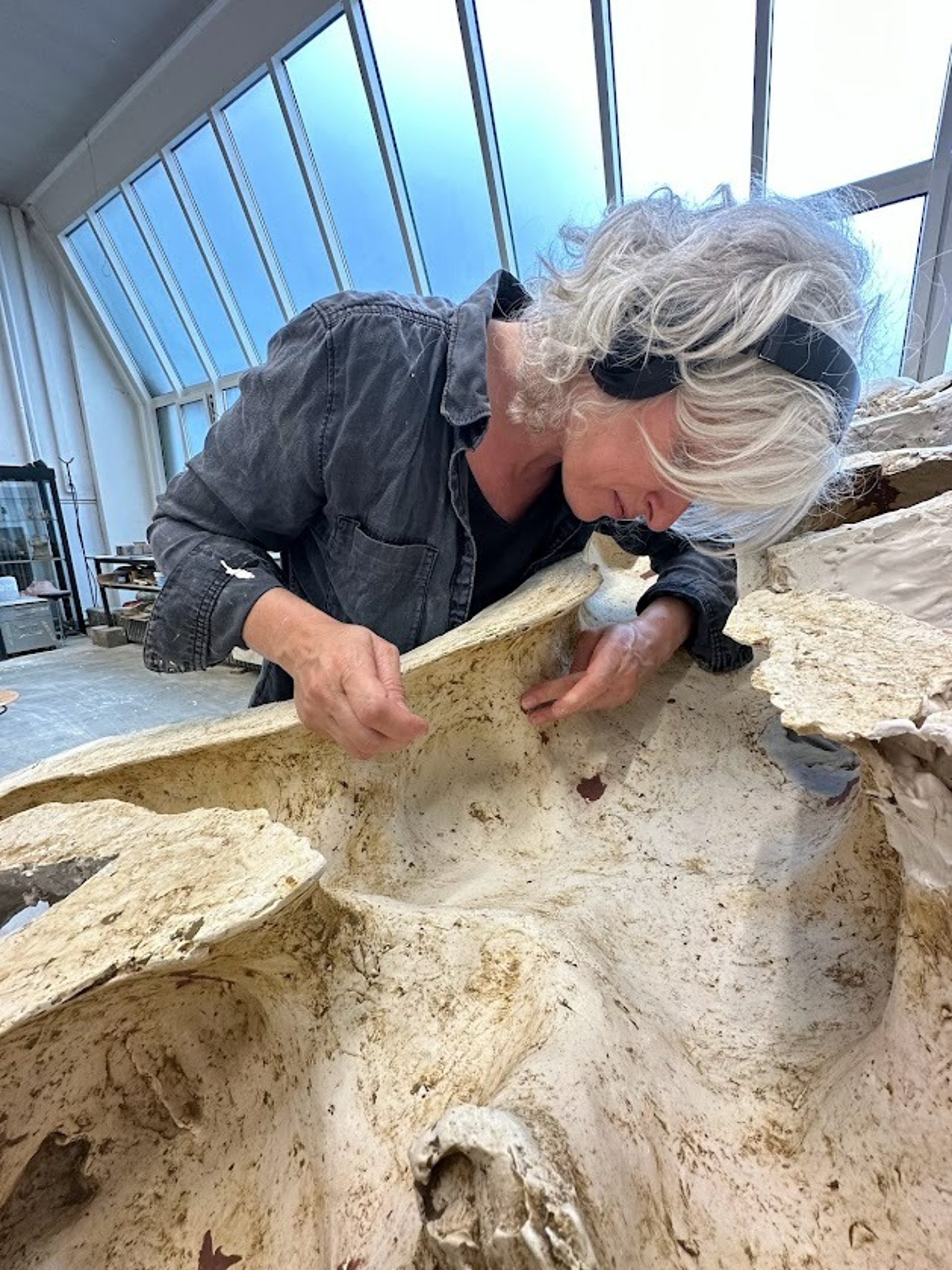 black and brown leather padded tub sofa