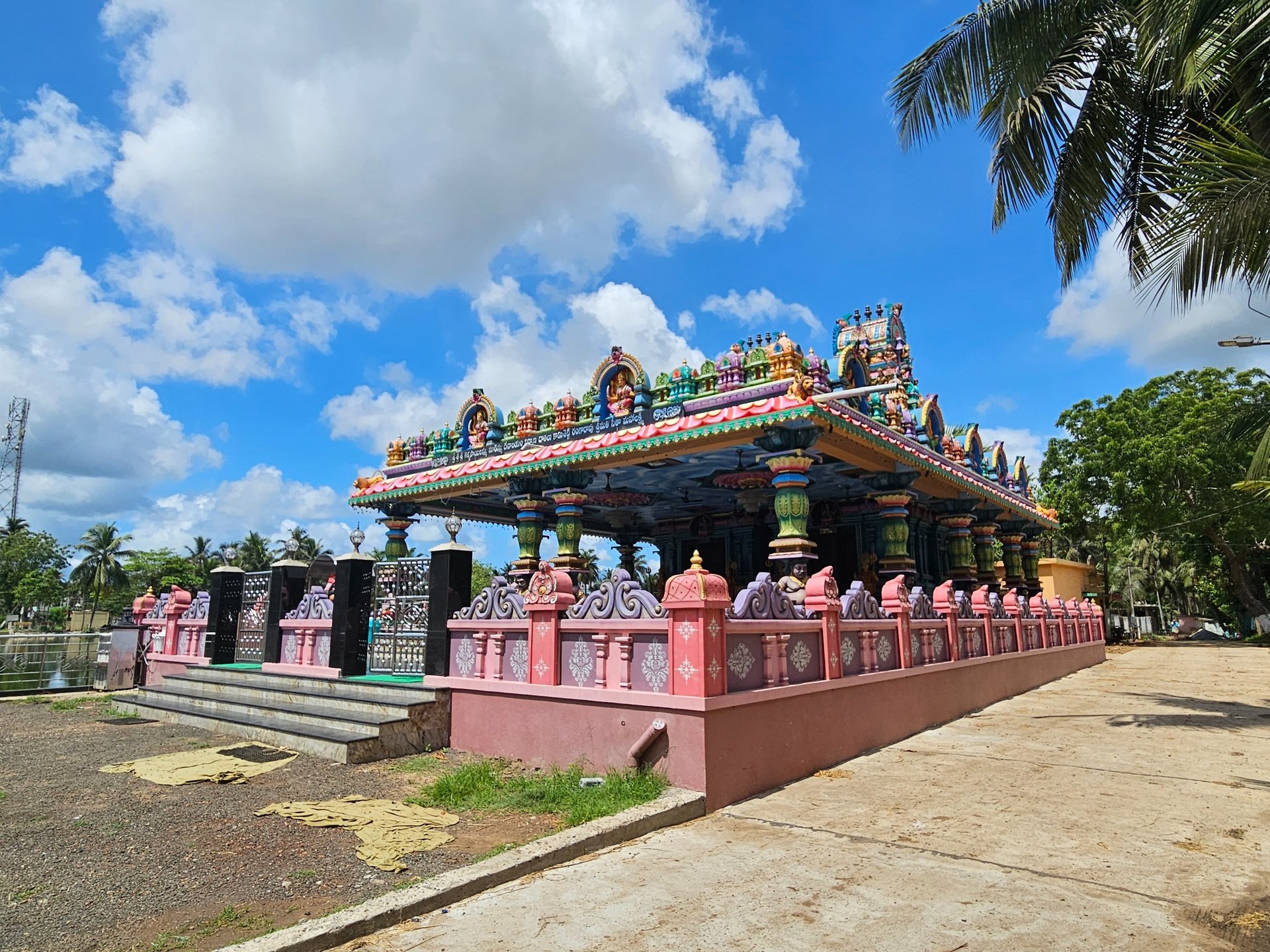 woman wearing yellow long-sleeved dress under white clouds and blue sky during daytime
