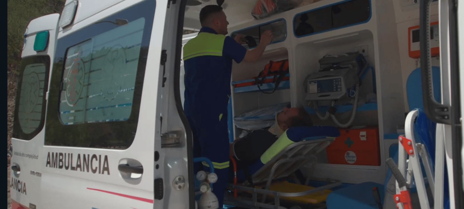 an abstract photo of a curved building with a blue sky in the background
