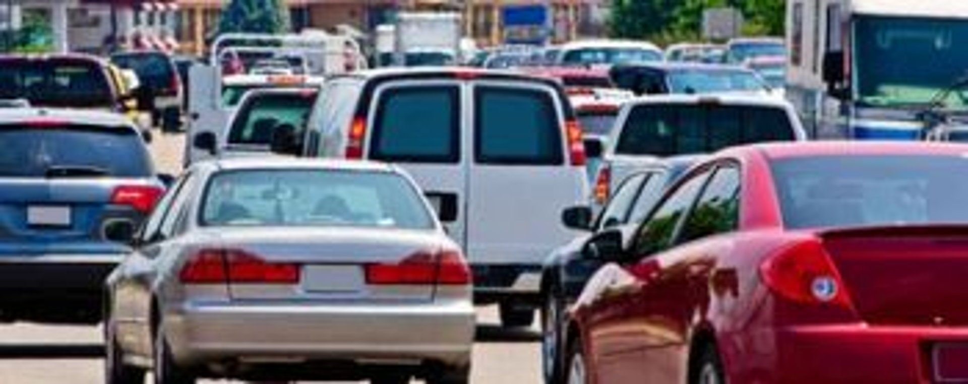 empty hallway between concrete buildings during daytime