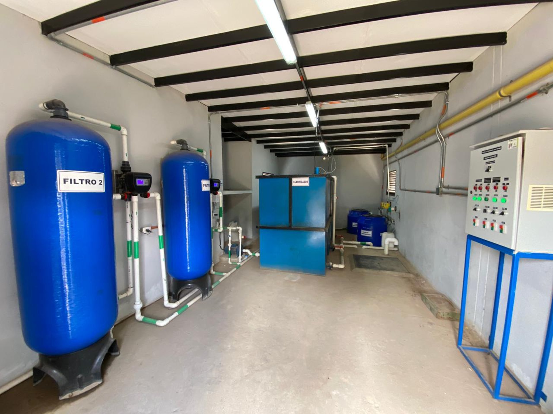an abstract photo of a curved building with a blue sky in the background