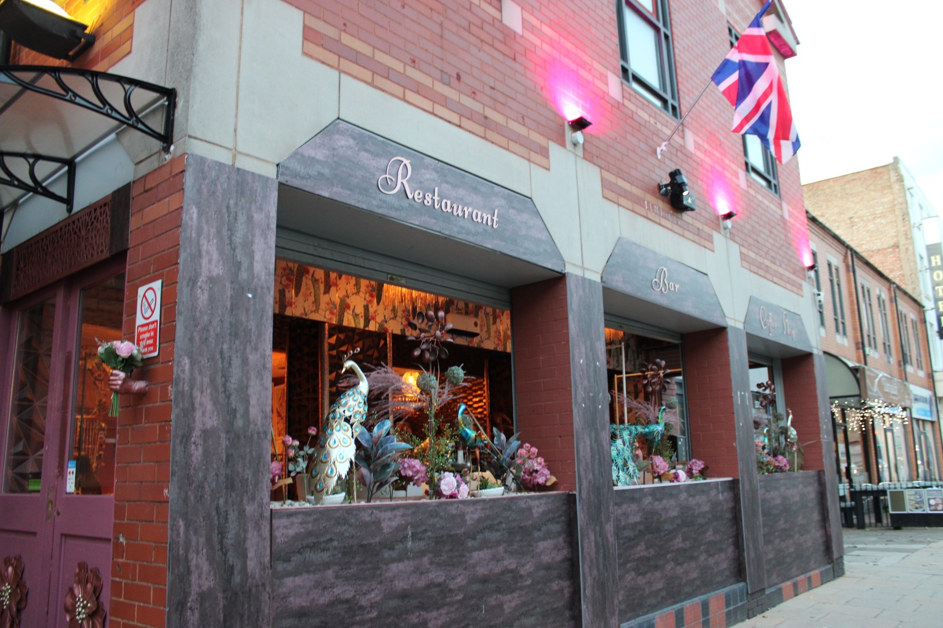 a close up of a black and brown abstract painting