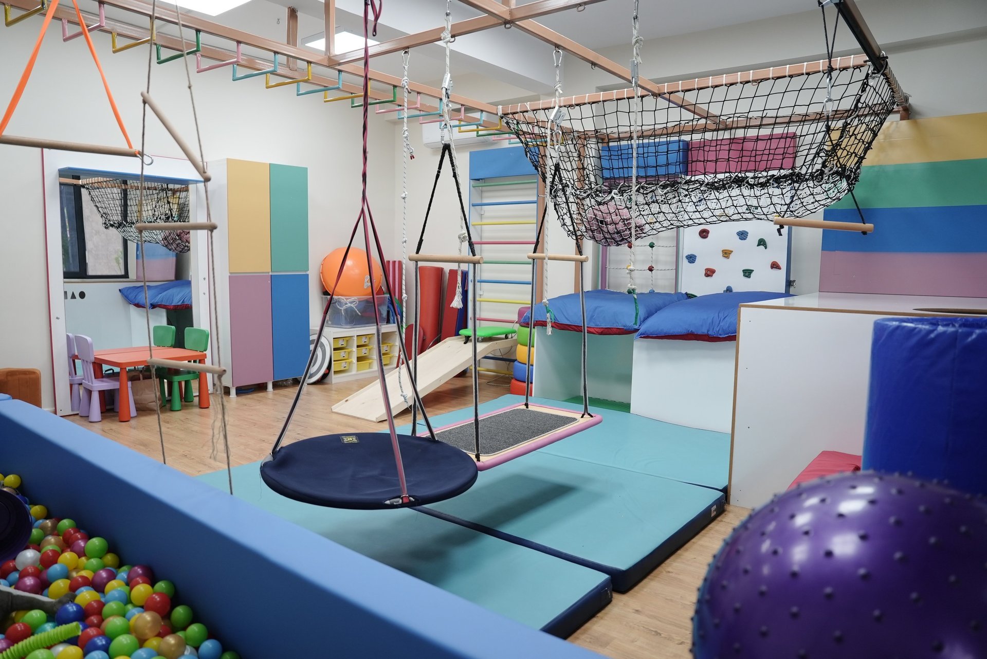 woman wearing yellow long-sleeved dress under white clouds and blue sky during daytime