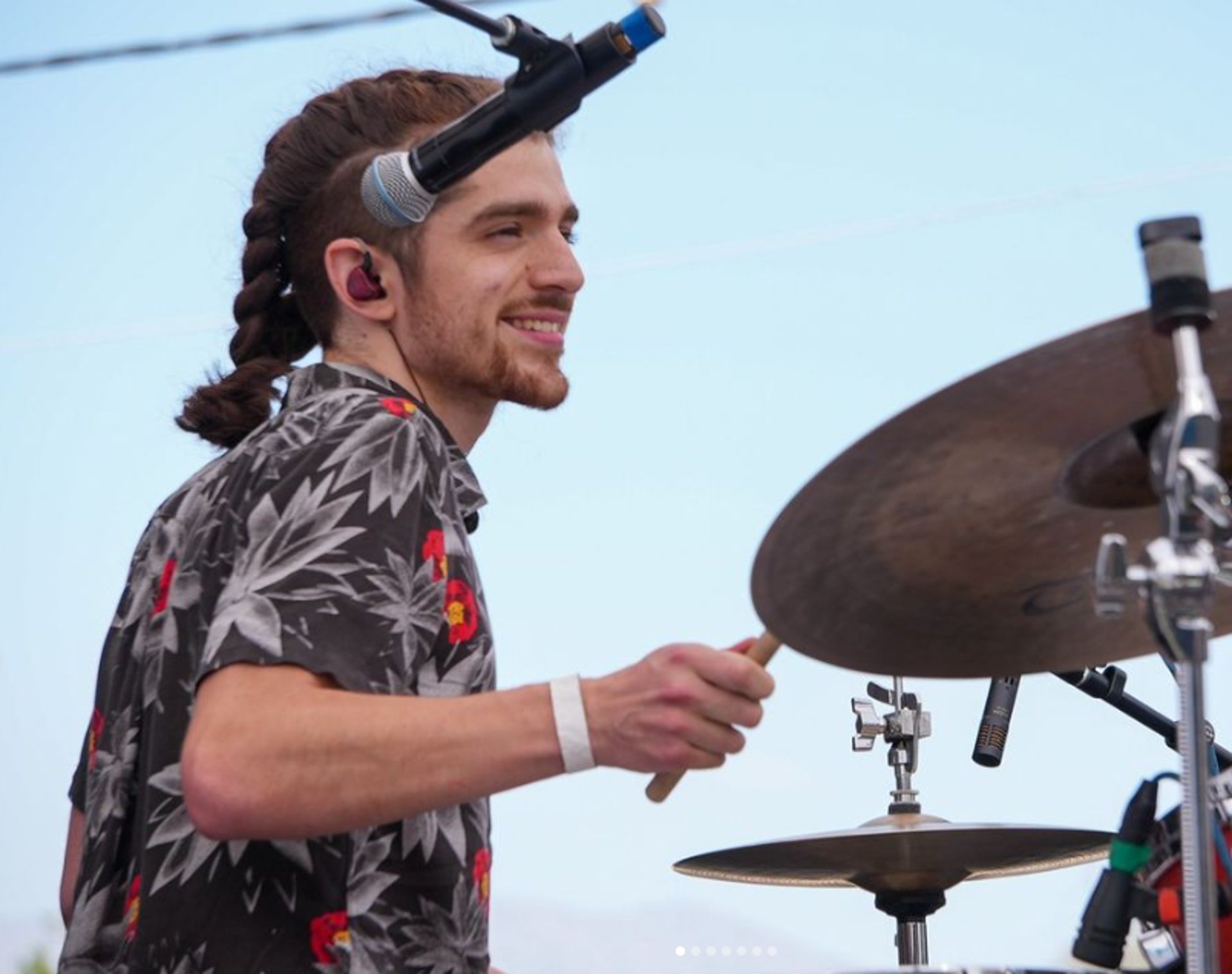 woman wearing yellow long-sleeved dress under white clouds and blue sky during daytime