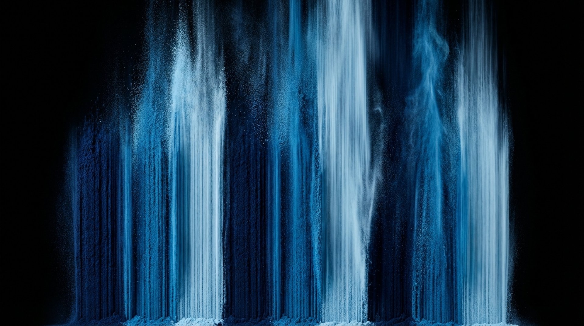 Abstract swirling blue and black liquid patterns