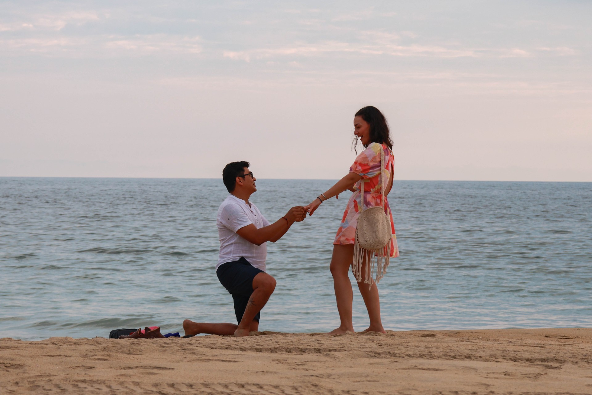 couple wearing silver-colored rings