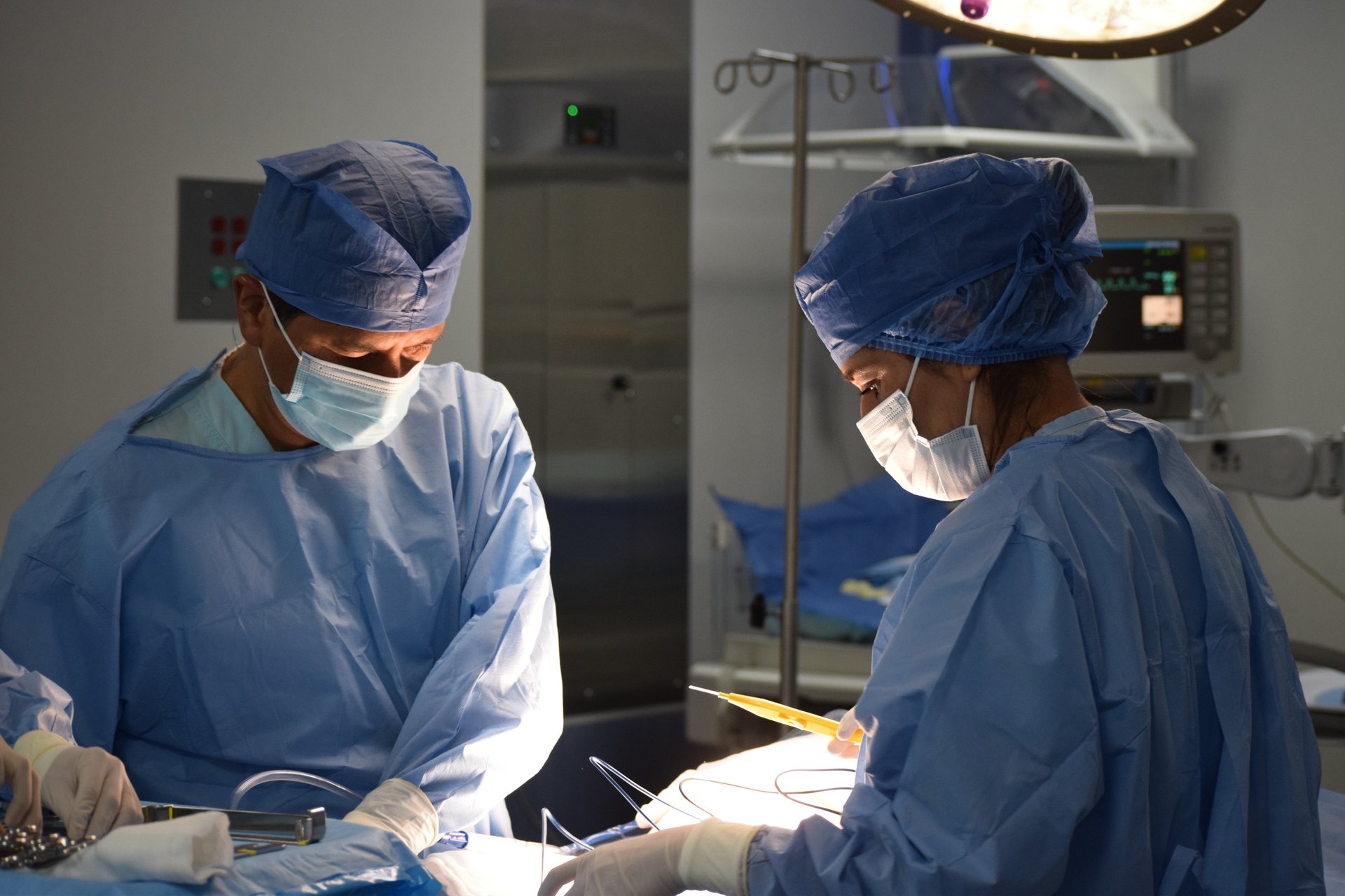 woman wears green face mask
