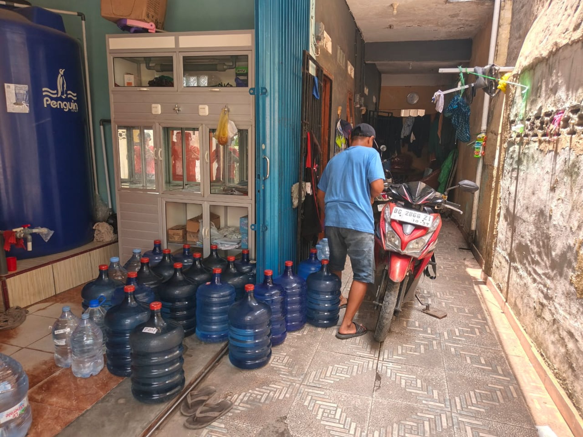woman wearing yellow long-sleeved dress under white clouds and blue sky during daytime