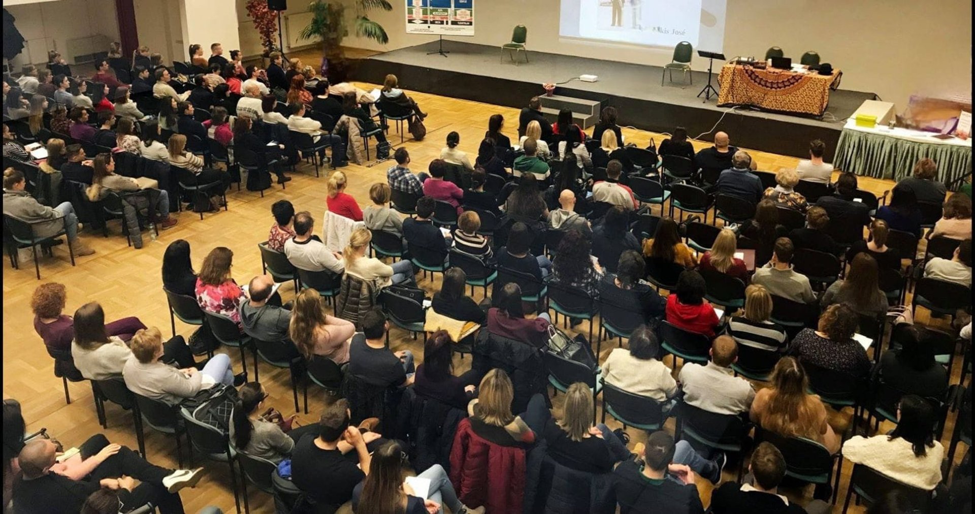 an abstract photo of a curved building with a blue sky in the background