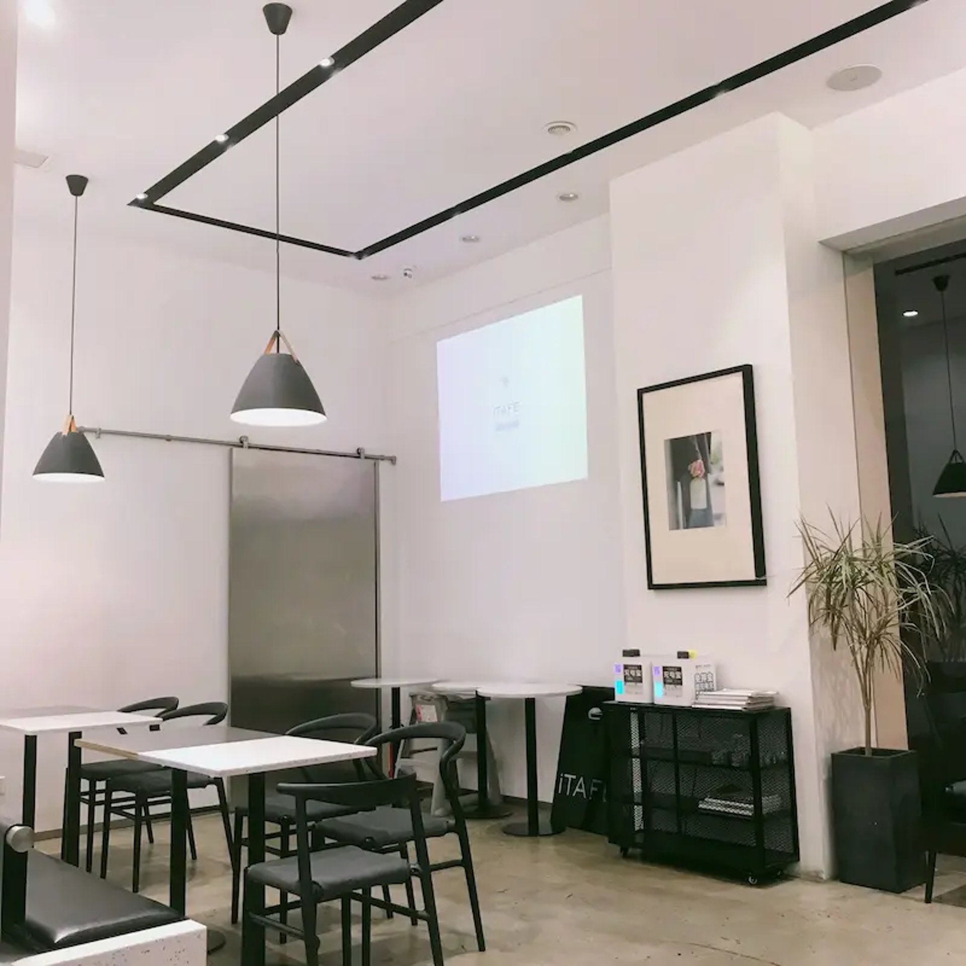 black and brown leather padded tub sofa