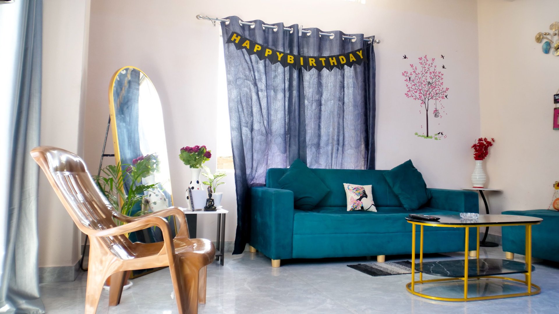 black and white bed near brown wooden table